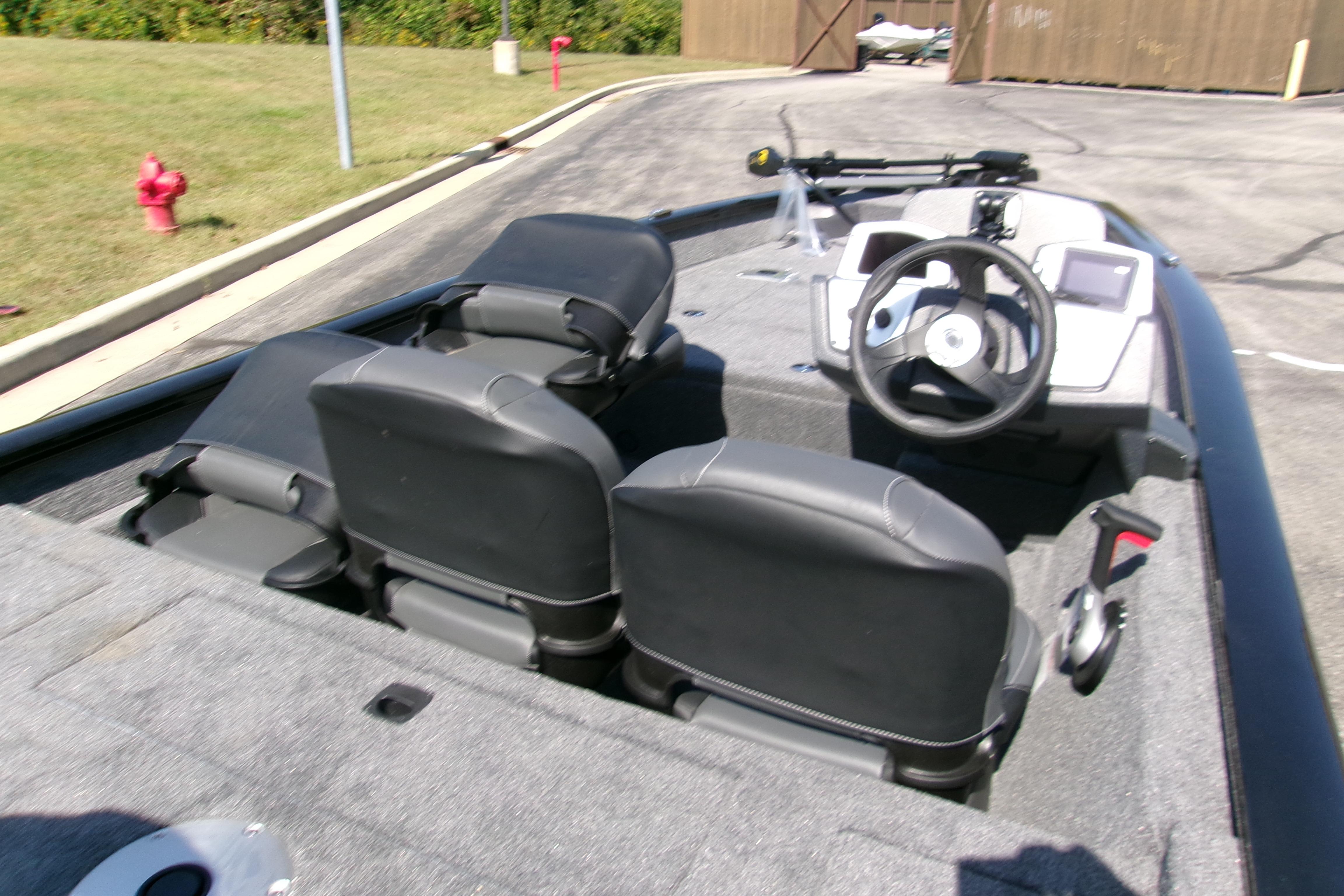 2026 Tracker Pro Team 175 Crappie Edition boat interior with steering wheel and seating.