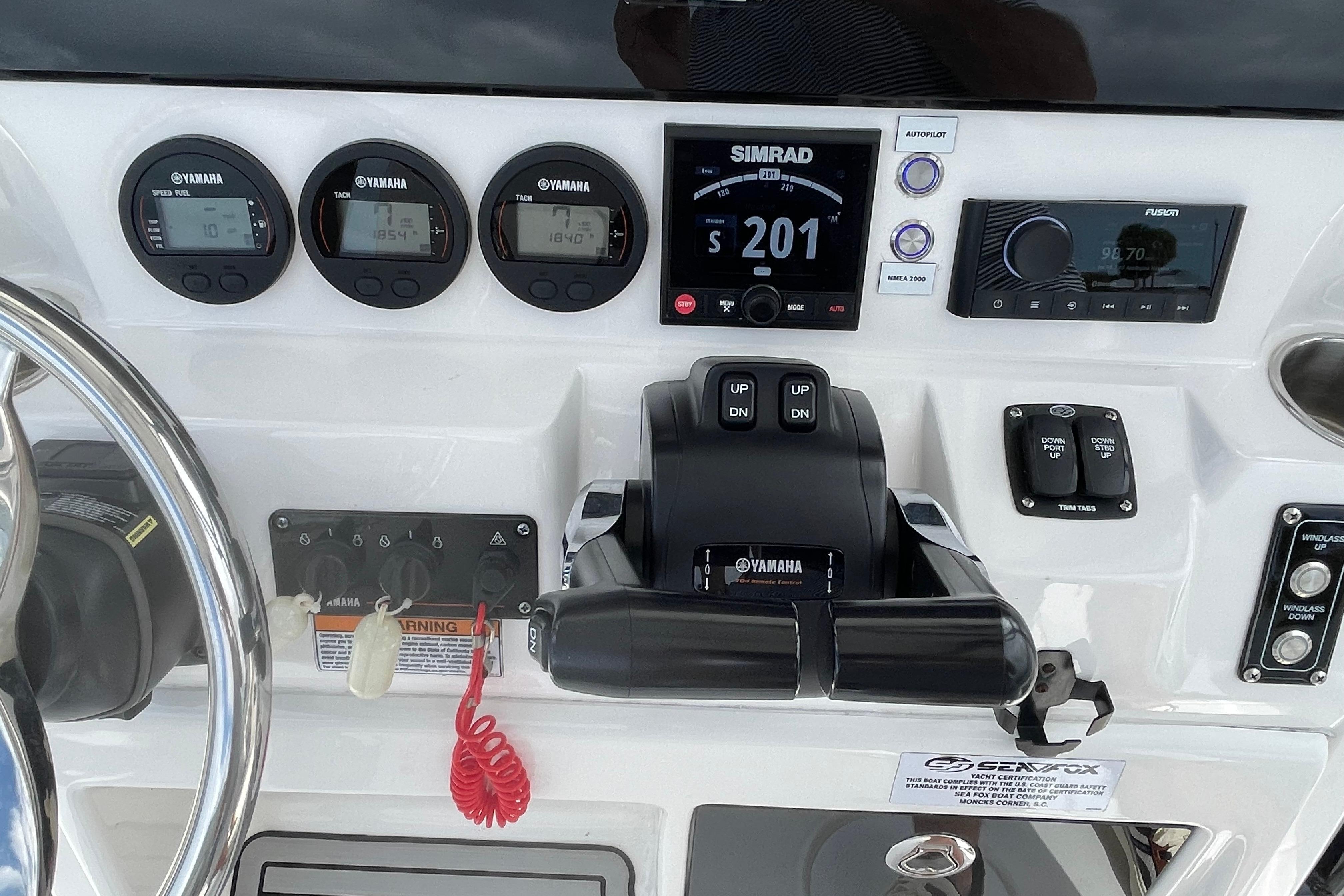 2023 Sea Fox 268 Commander dashboard with Yamaha controls and Simrad display.