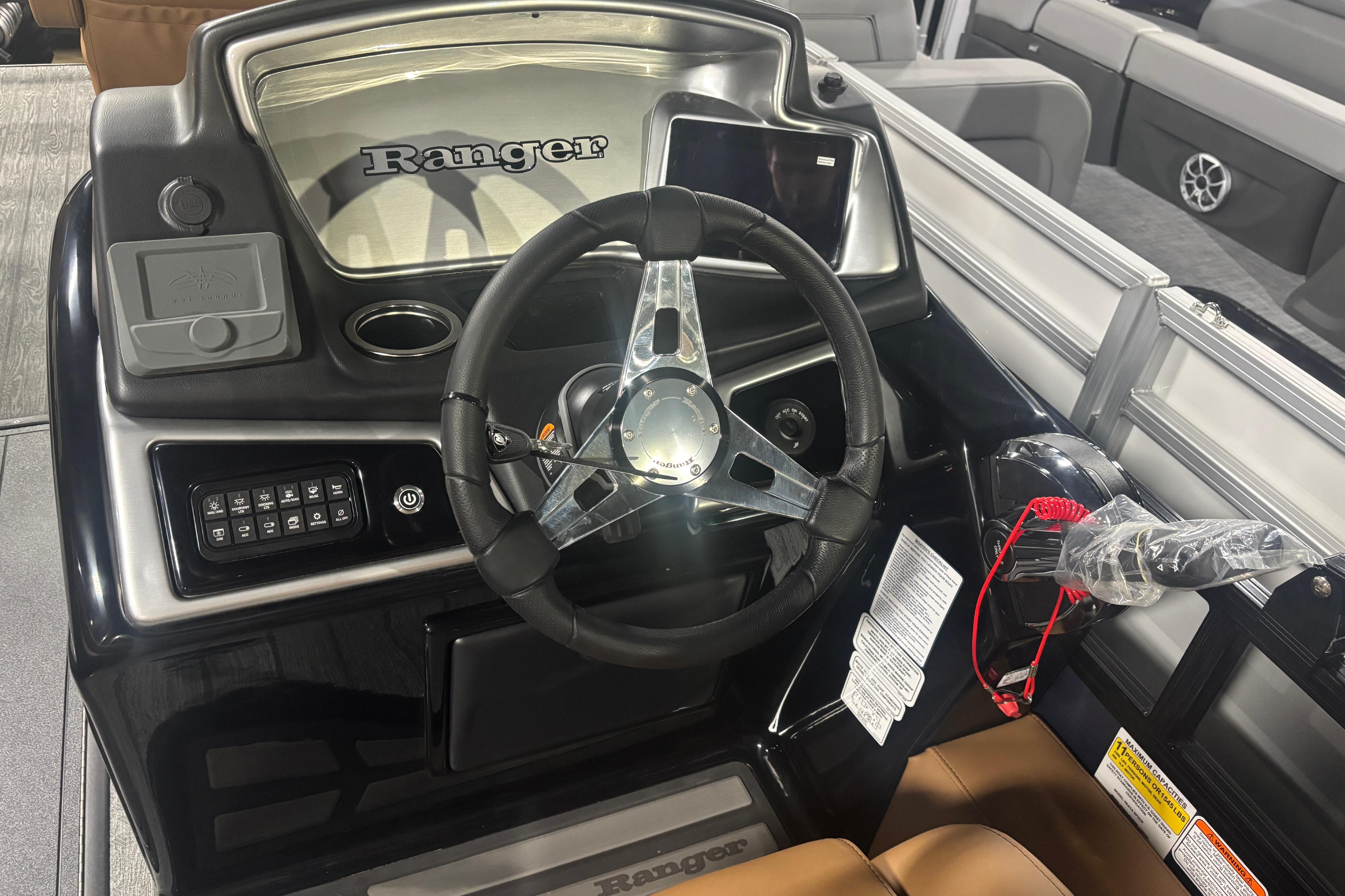2026 Ranger 223F boat dashboard with steering wheel and control panel.