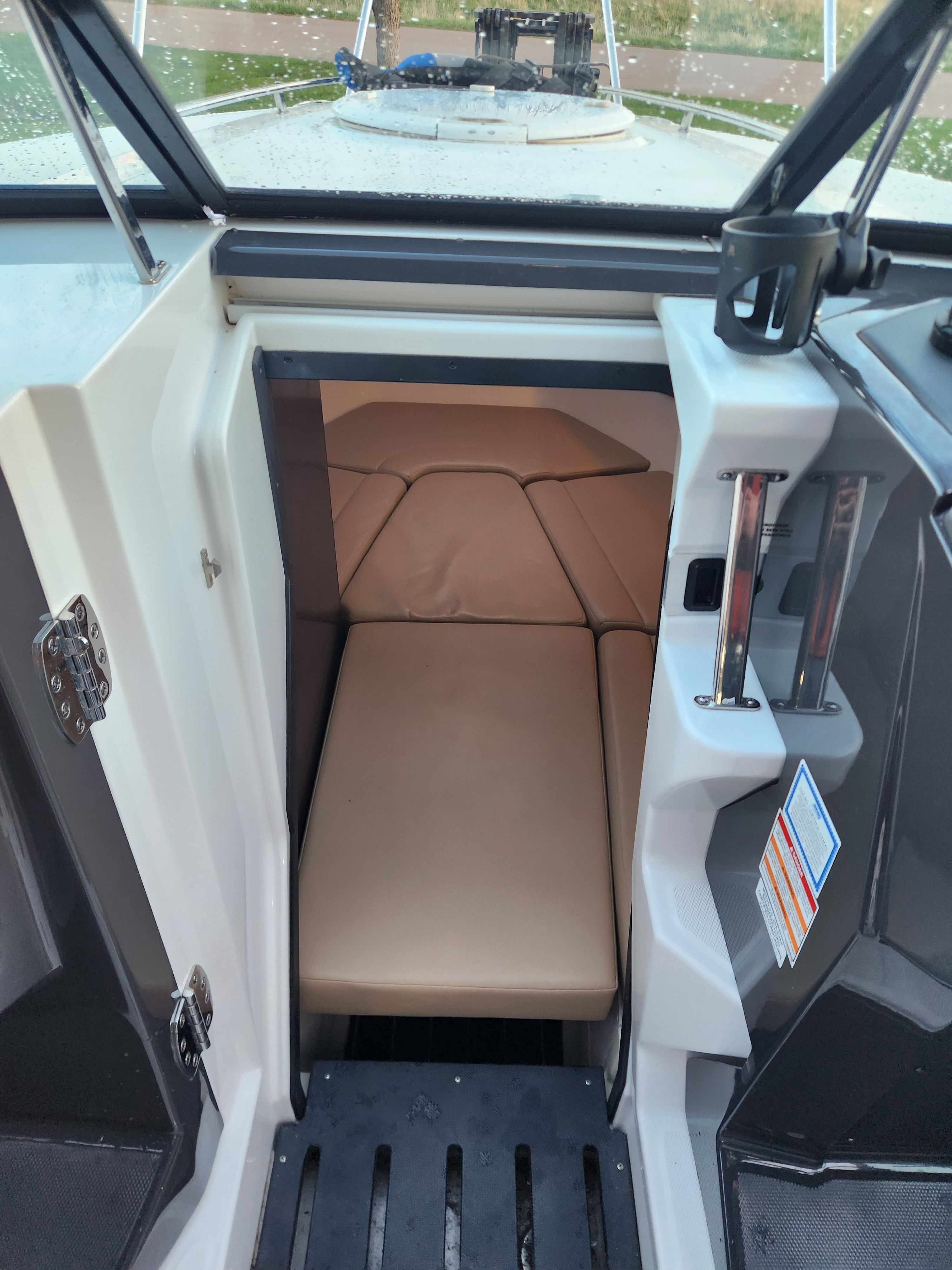 Interior of a 2015 Monterey 268SSC with seating area.
