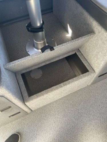 2025 Spartan 2600 Olympia interior storage compartment with metallic support pole.