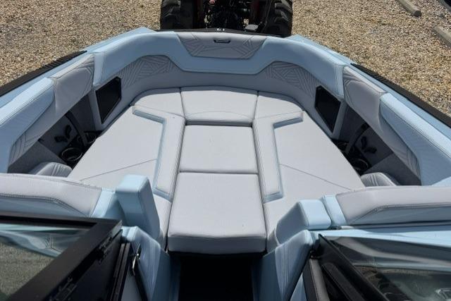2026 MasterCraft XStar 25 boat interior with light blue seating and modern design.