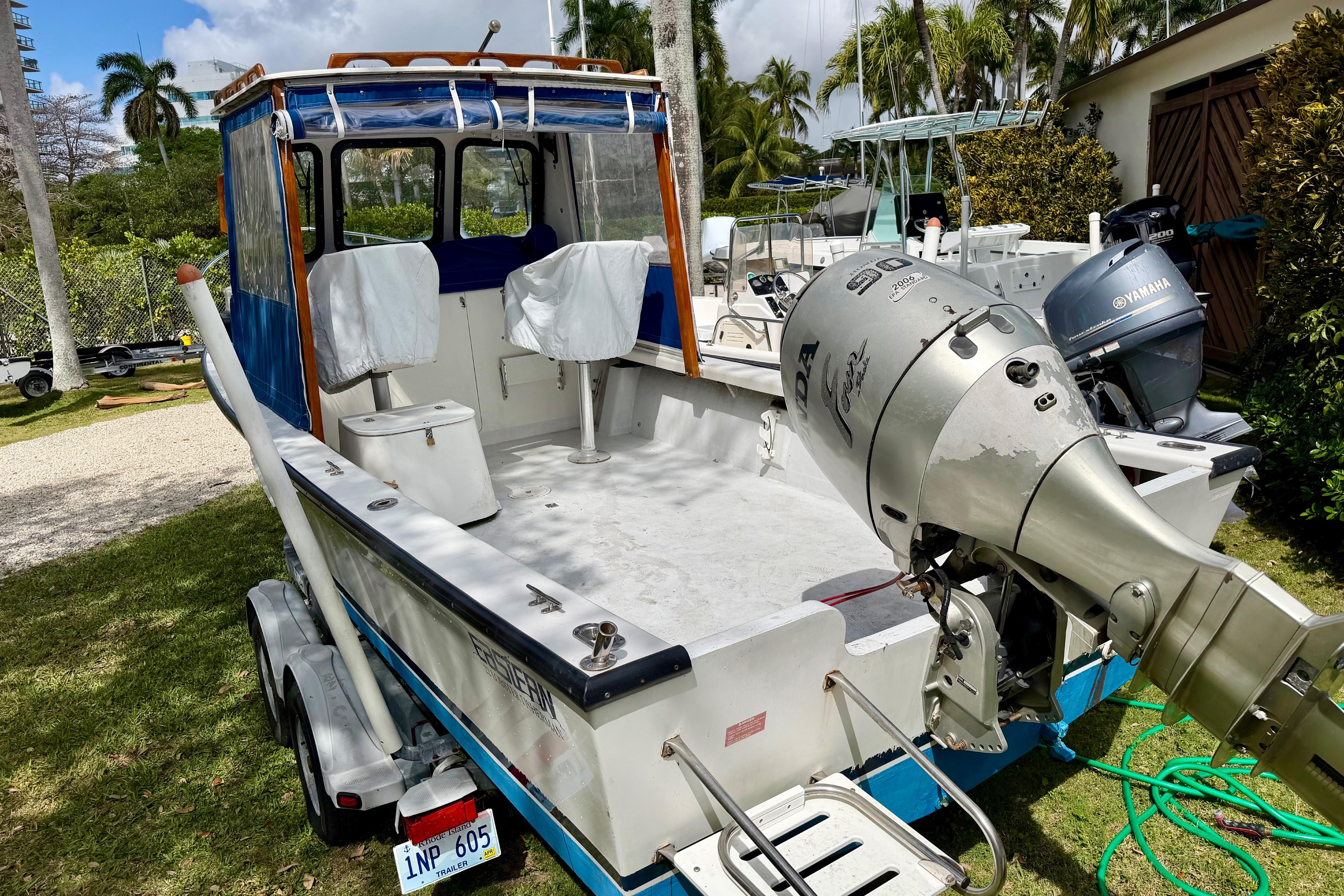 2000 Eastern 22 Lobster Fisherman boat with Honda outboard motor, parked on a trailer.