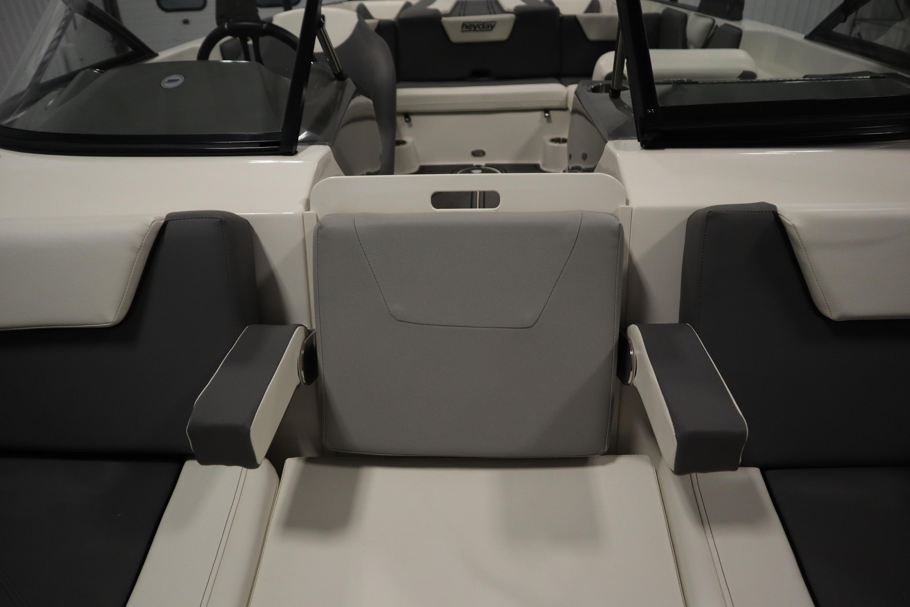 2023 Heyday WT Surf boat interior with gray and white seating.