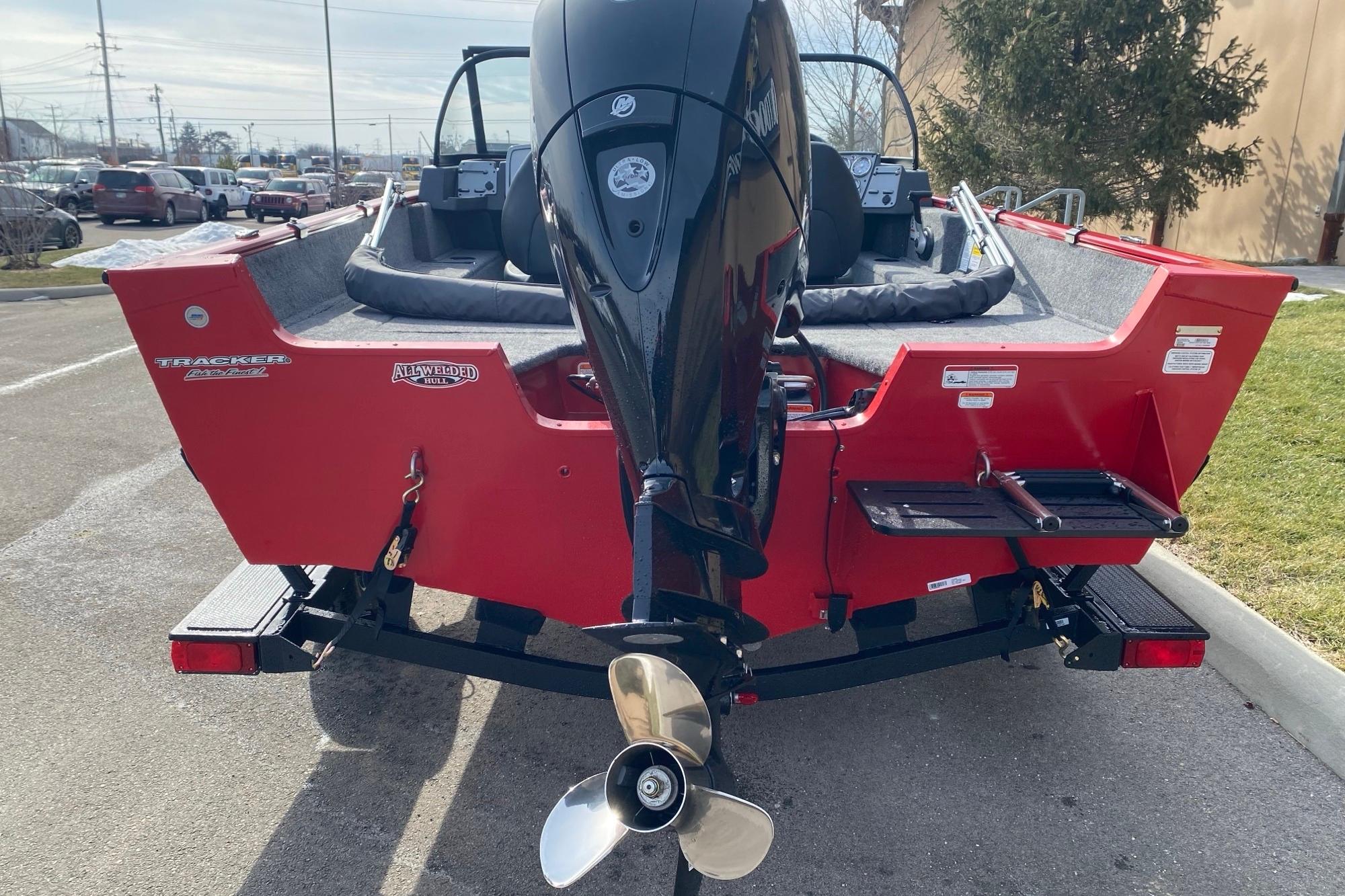 2026 Tracker Pro Guide V-175 Combo boat, red exterior, parked on a trailer.