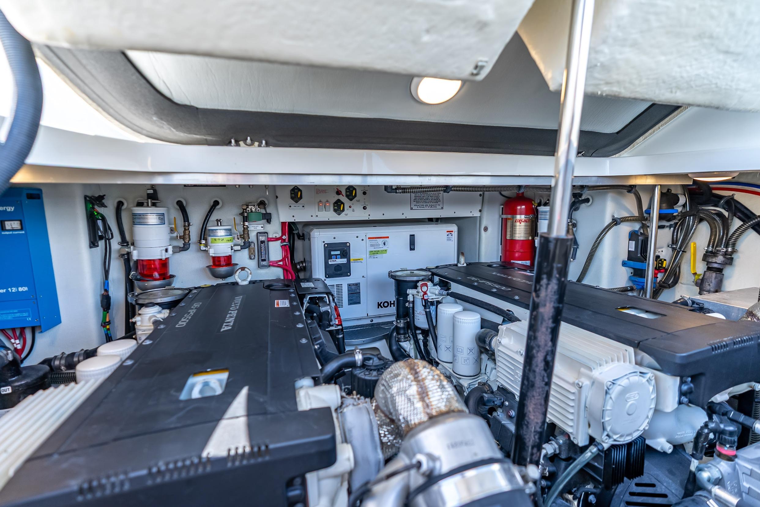 Engine room of 2022 Formula 40 Performance Cruiser with dual engines and safety equipment.