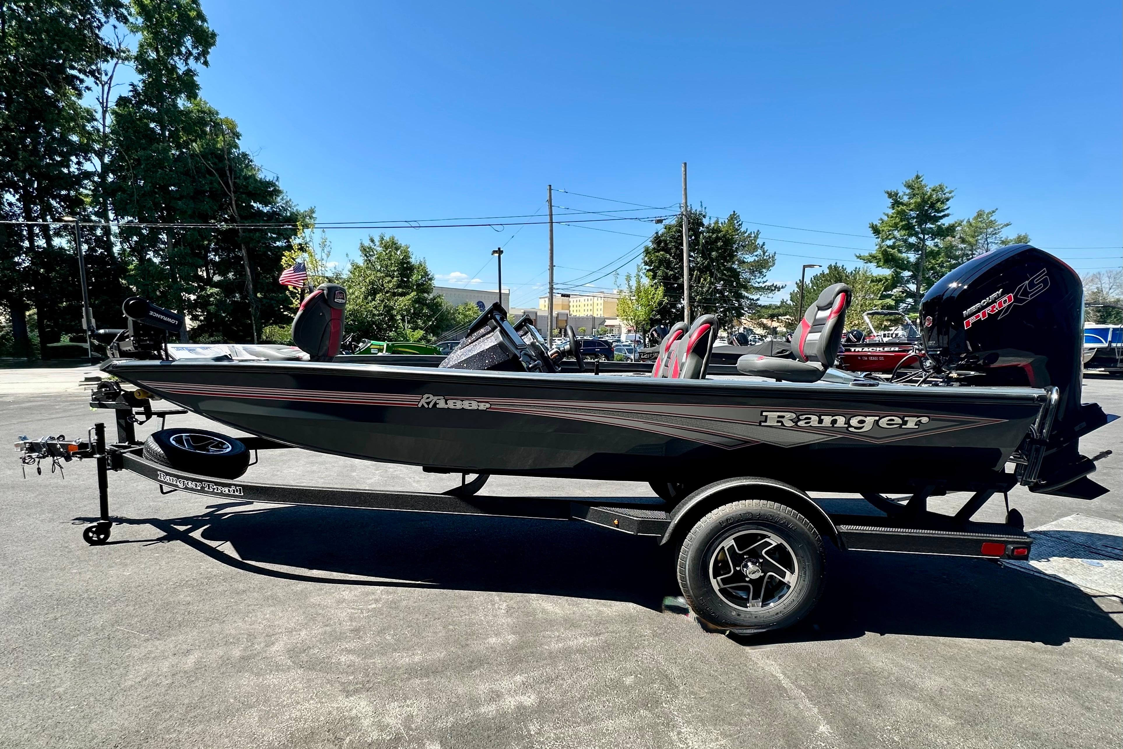 2026 Ranger RT188P fishing boat on trailer, parked outdoors under clear sky.