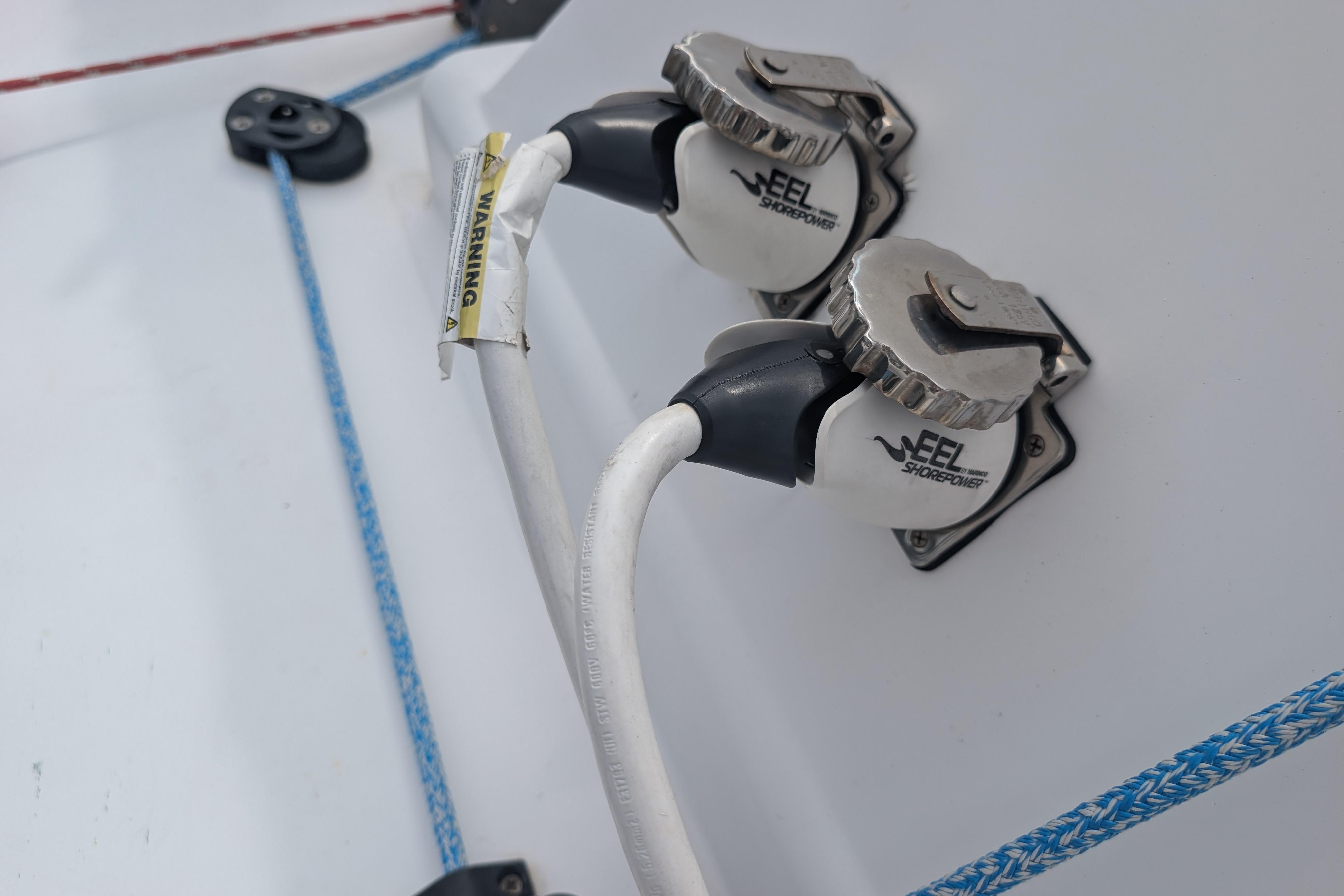 EEL shore power connectors on 1999 Island Spirit 37 sailboat deck.