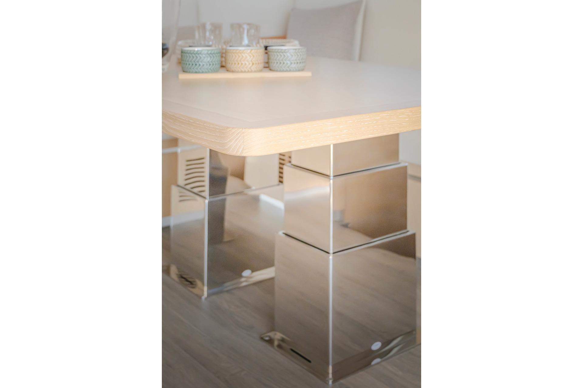Modern table with shiny legs, Privilege Signature 510, 2025.
