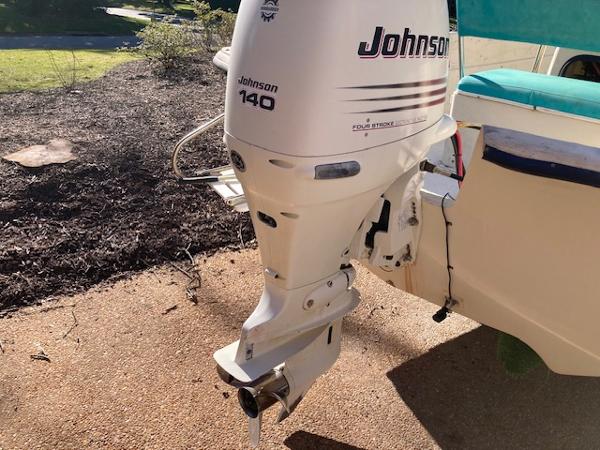 Johnson 140 outboard motor on 1997 Carolina Skiff 198 DLV boat.
