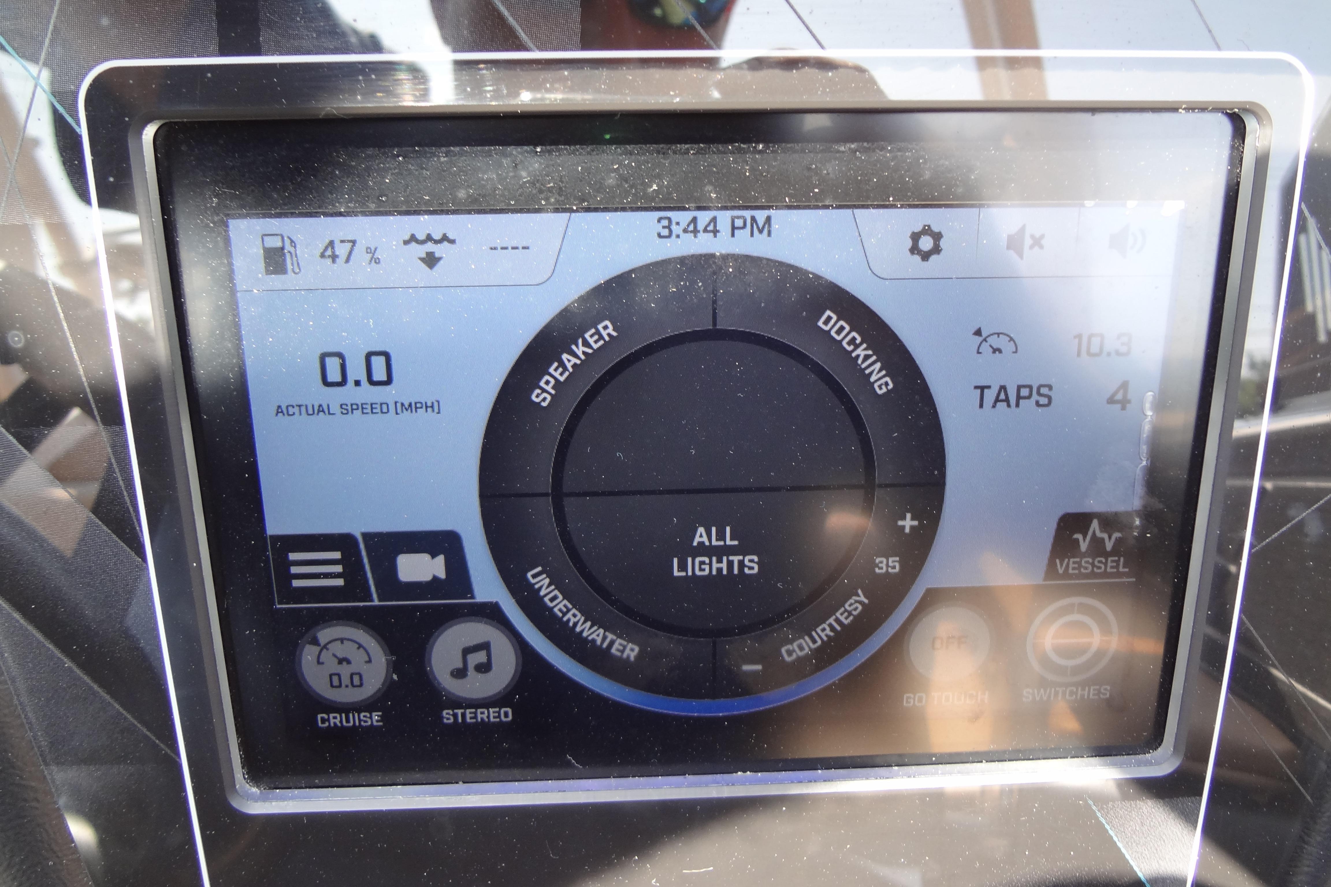 Touchscreen display of a 2022 ATX Surf Boats 24 Type-S, showing speed and control settings.