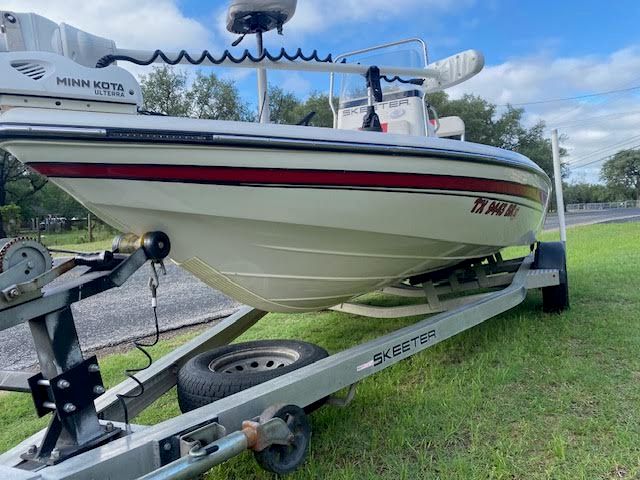 2012 Skeeter ZX200 boat on trailer, side view.