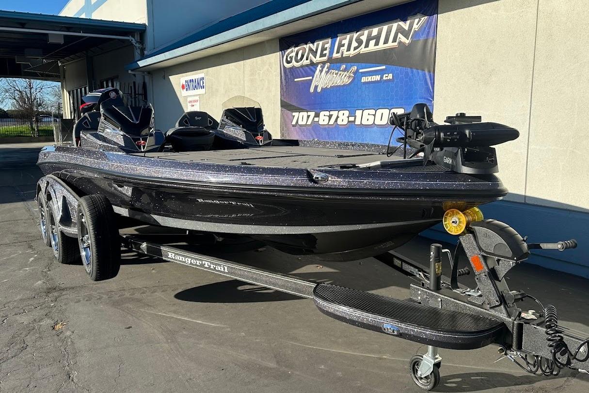 2026 Ranger Z521R Garmin Cup-Equipped boat on trailer outside dealership.