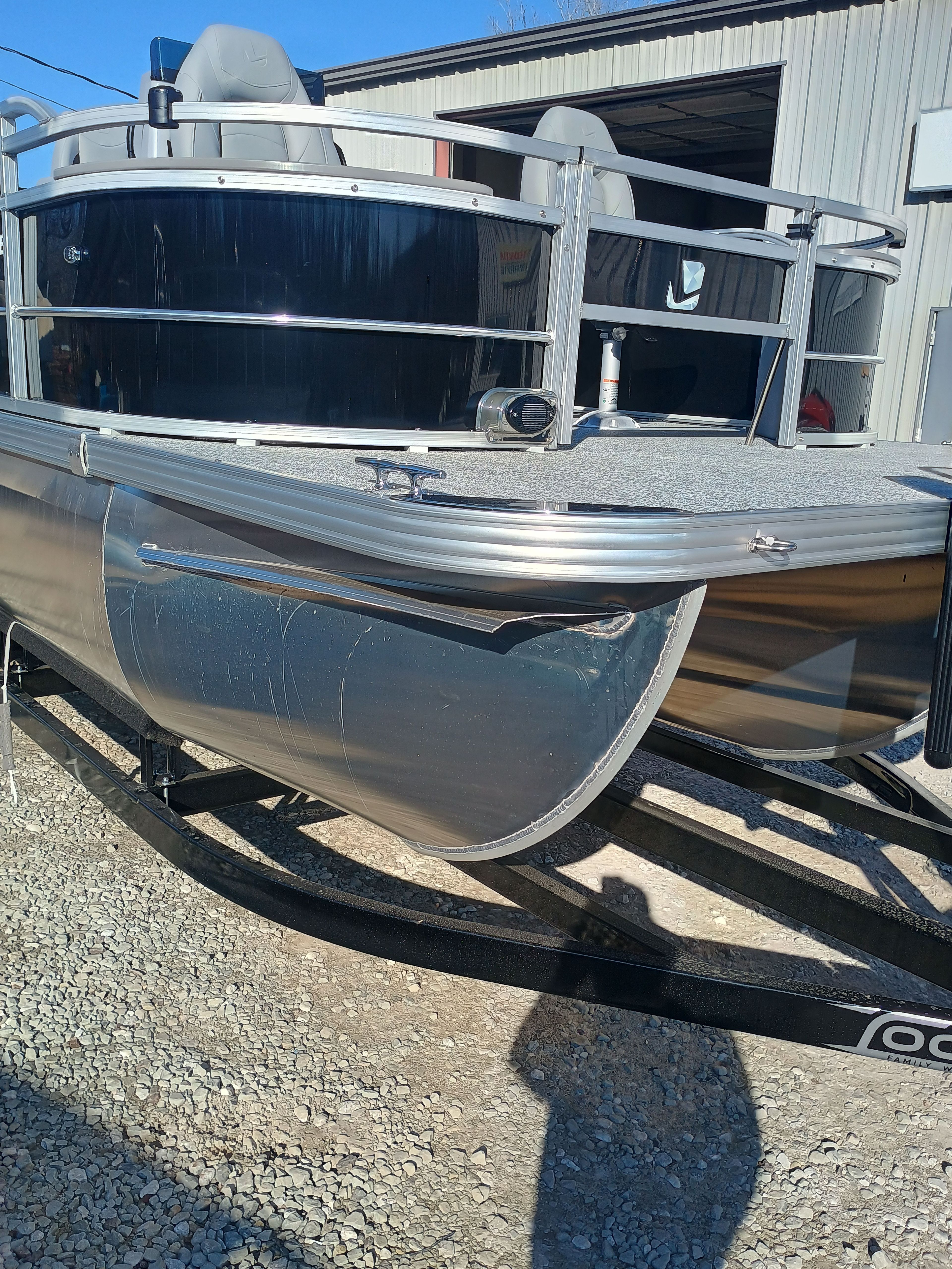 2026 Landau Alure 25CC Fish-Black pontoon boat on trailer.