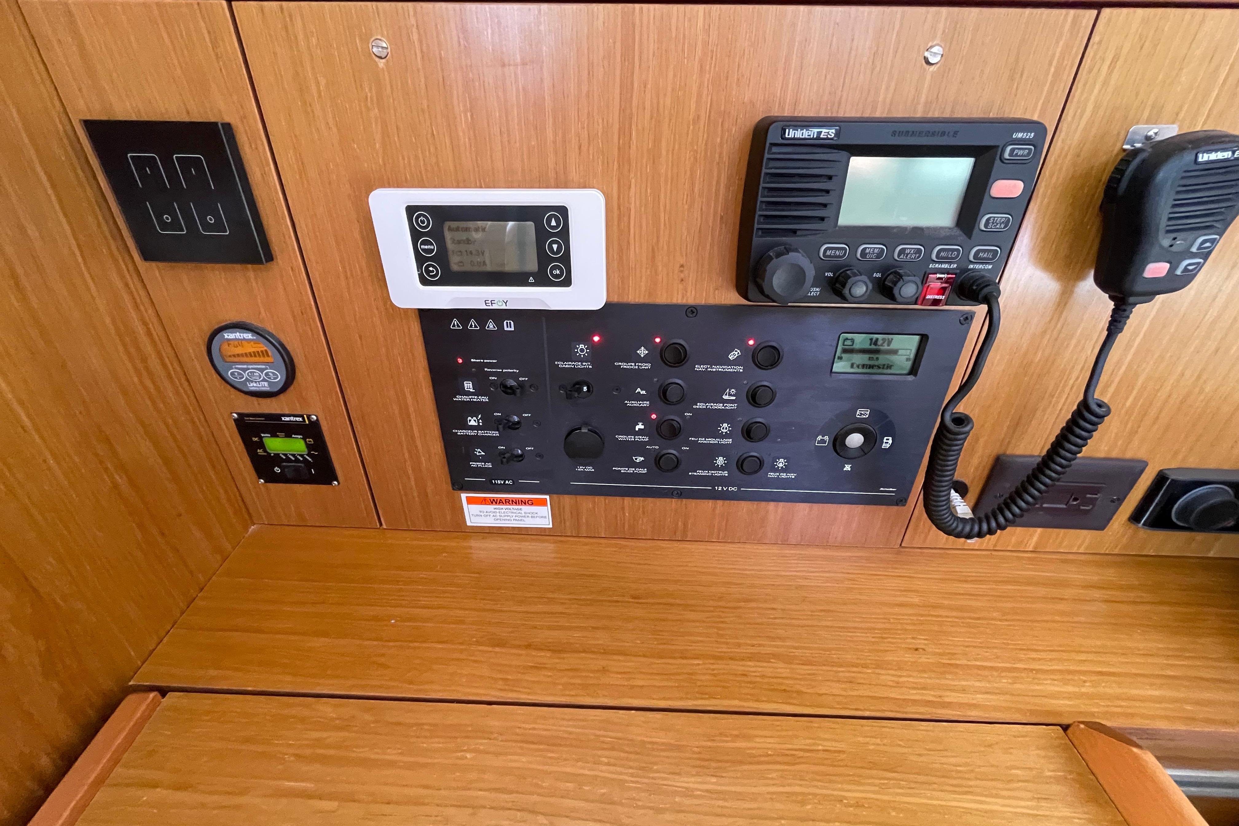 Control panel of a 2007 Jeanneau Sun Odyssey 39 DS sailboat, featuring navigation and communication equipment.