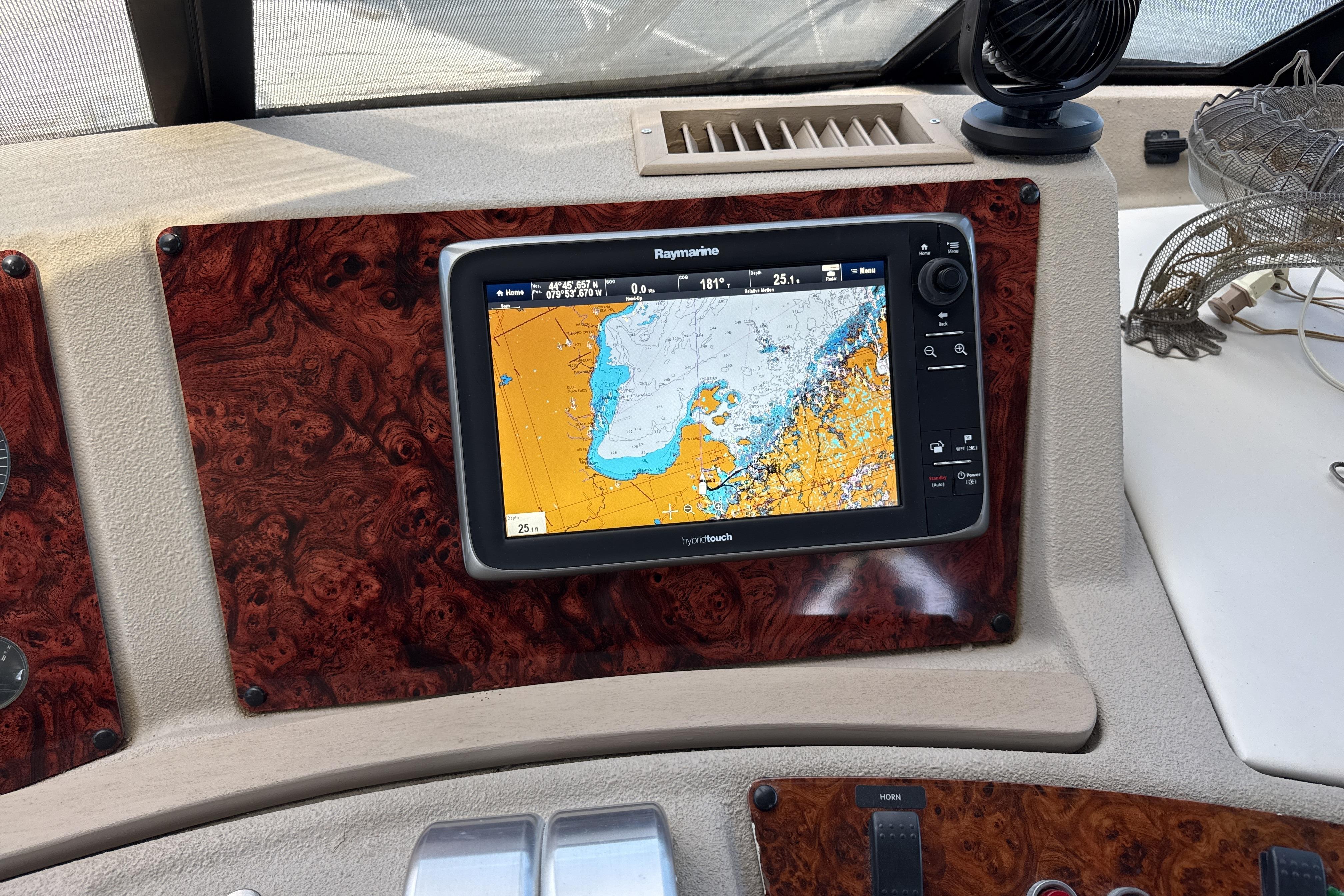 Navigation system on 1997 Bayliner 4788 Pilot House Motoryacht dashboard.