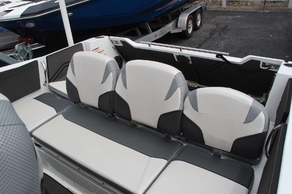 2023 Scarab 255 Open ID boat interior with three gray and white seats.