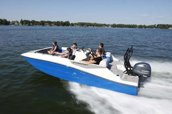 2025 Starcraft SV 16 OB boat cruising on a lake with passengers enjoying the ride.