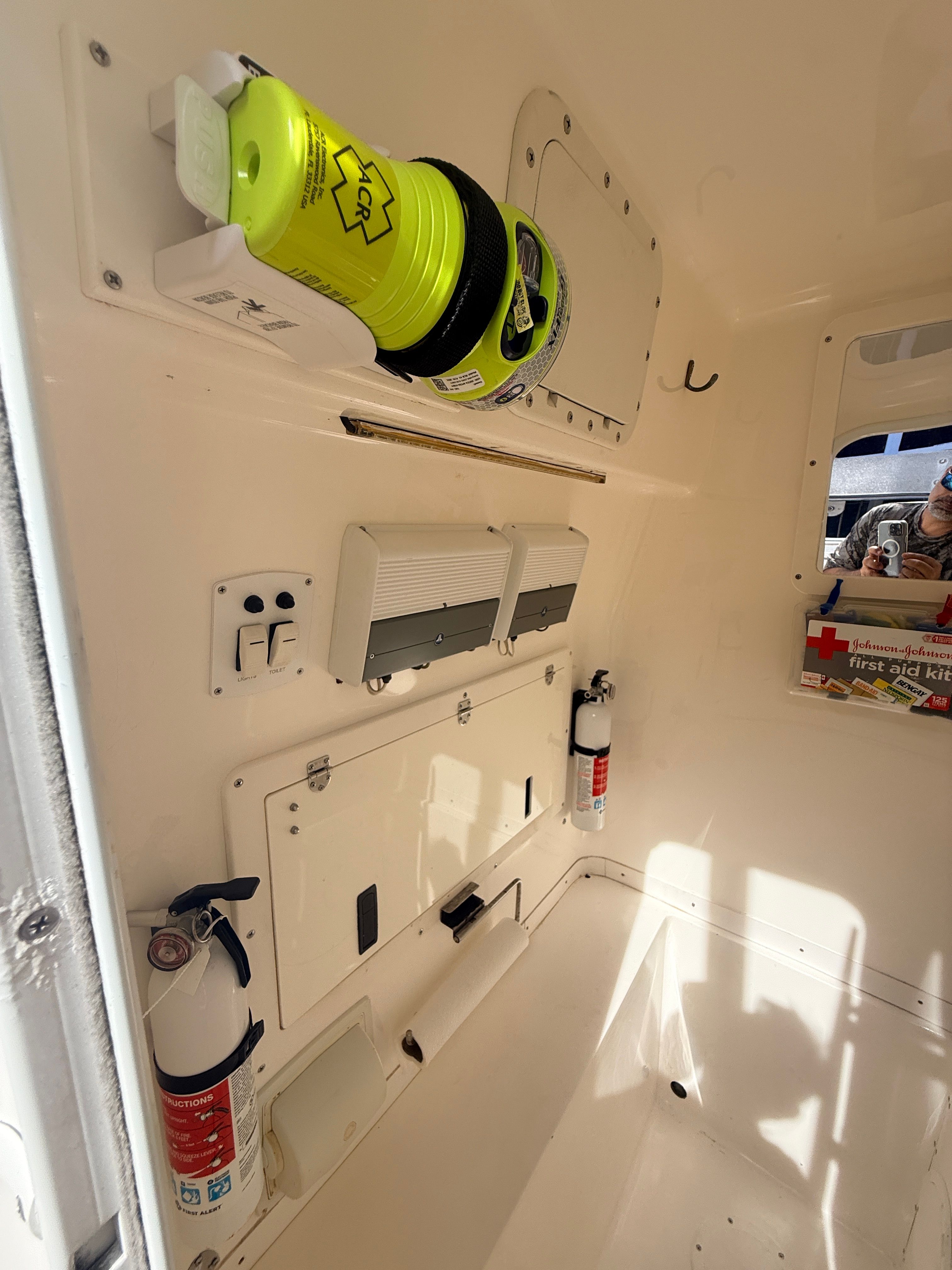 Interior of a 2007 Fountain 32 Center Console boat with safety equipment.
