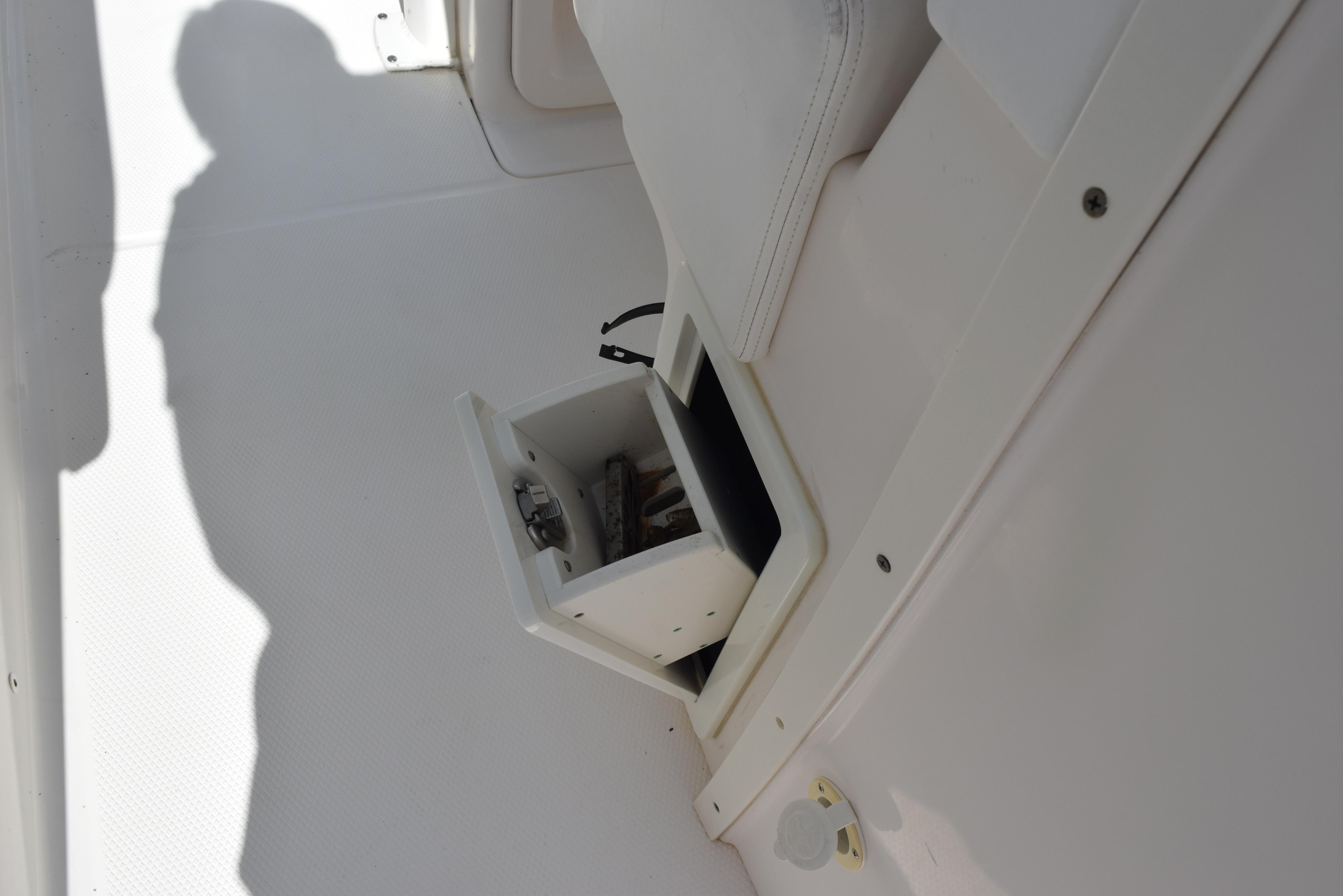 2019 Robalo R272 Center Console storage compartment detail.
