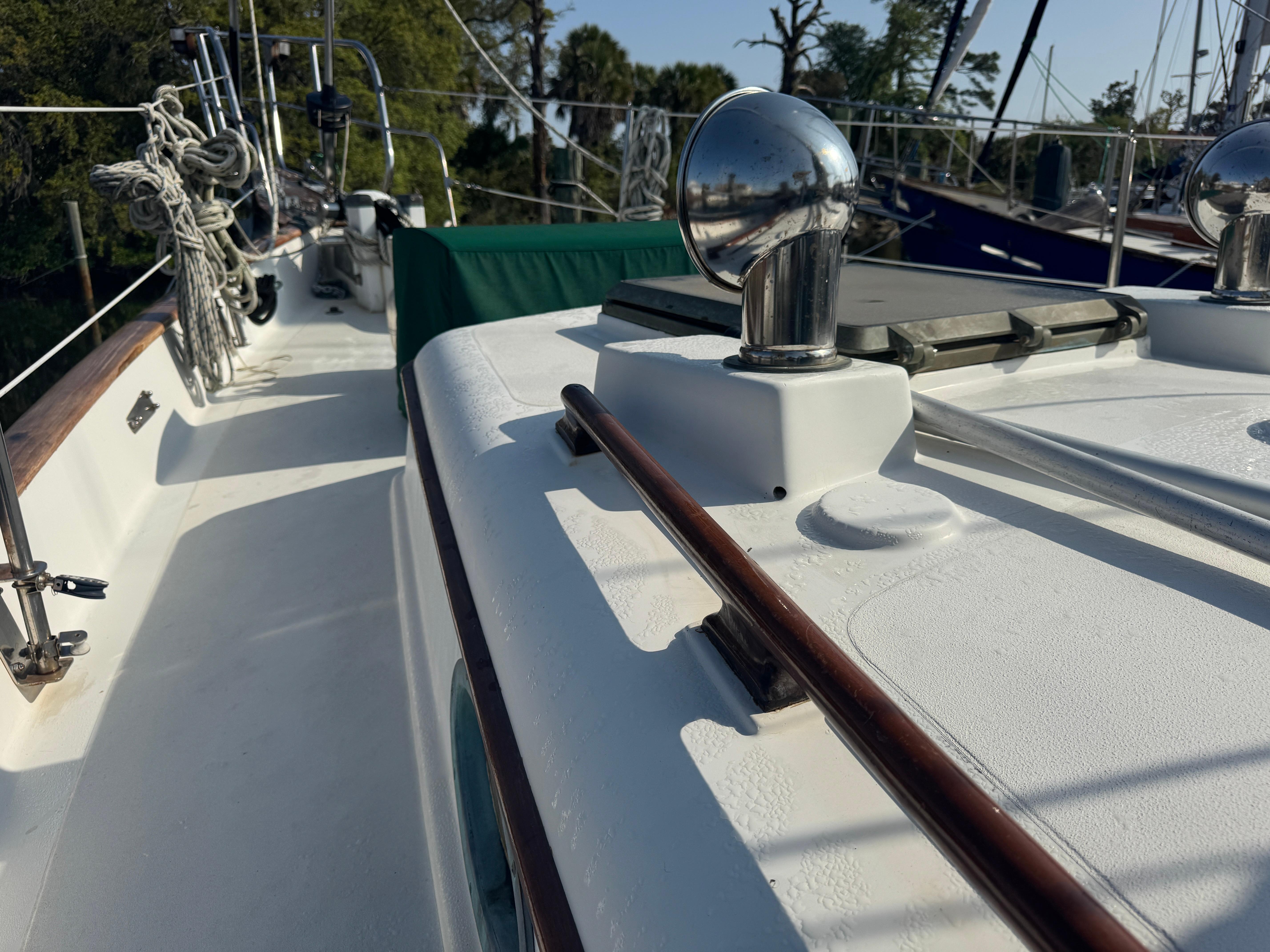 Deck view of 1989 Hans Christian 43T sailboat with polished fittings and rigging.