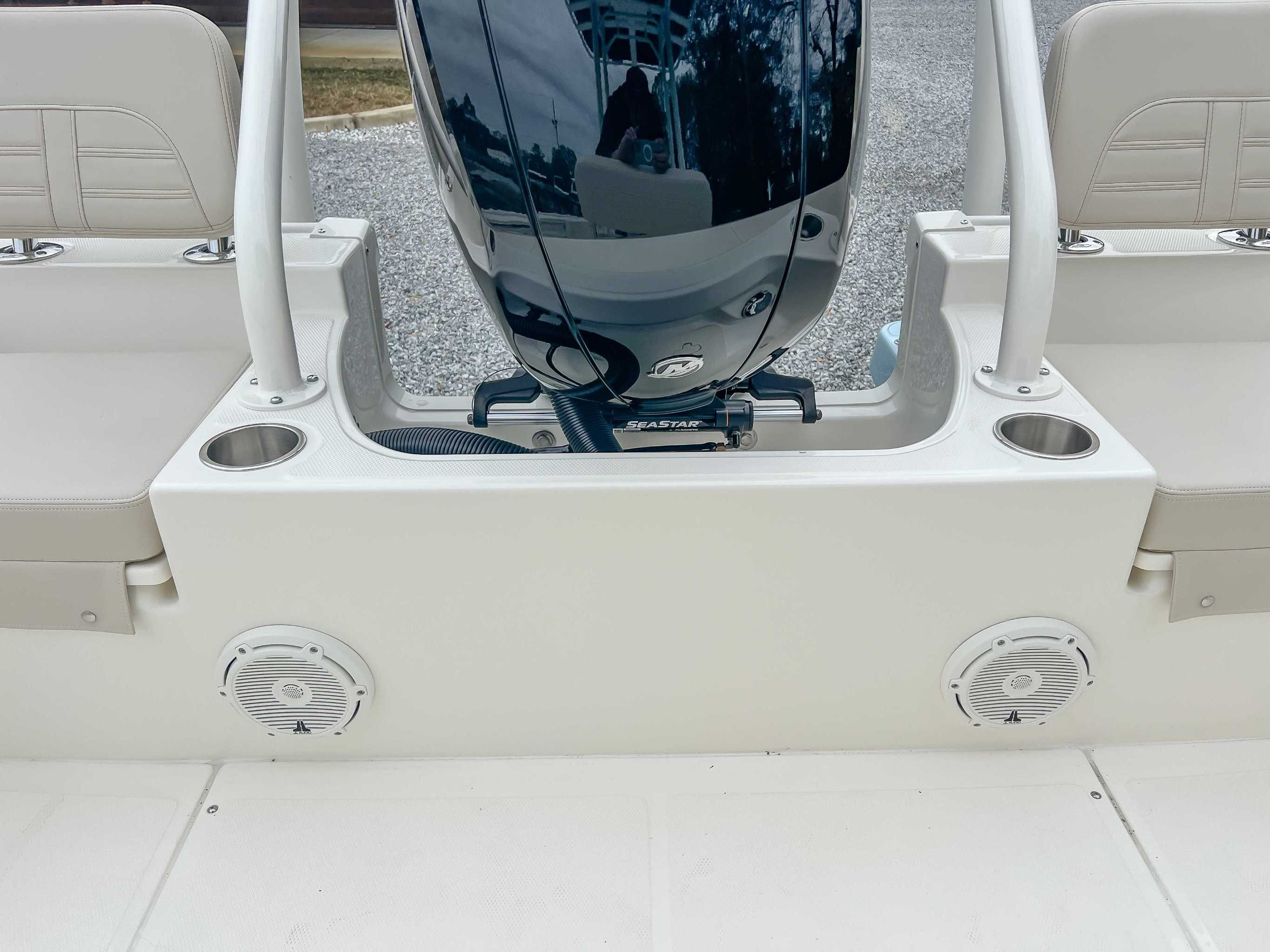 Boston Whaler 190 Montauk 2025 boat rear with motor and speakers.