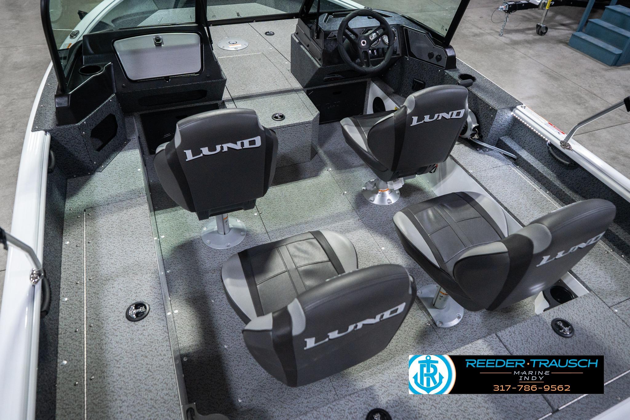 2026 Lund 1700 Explorer Sport boat interior with four seats and steering console.