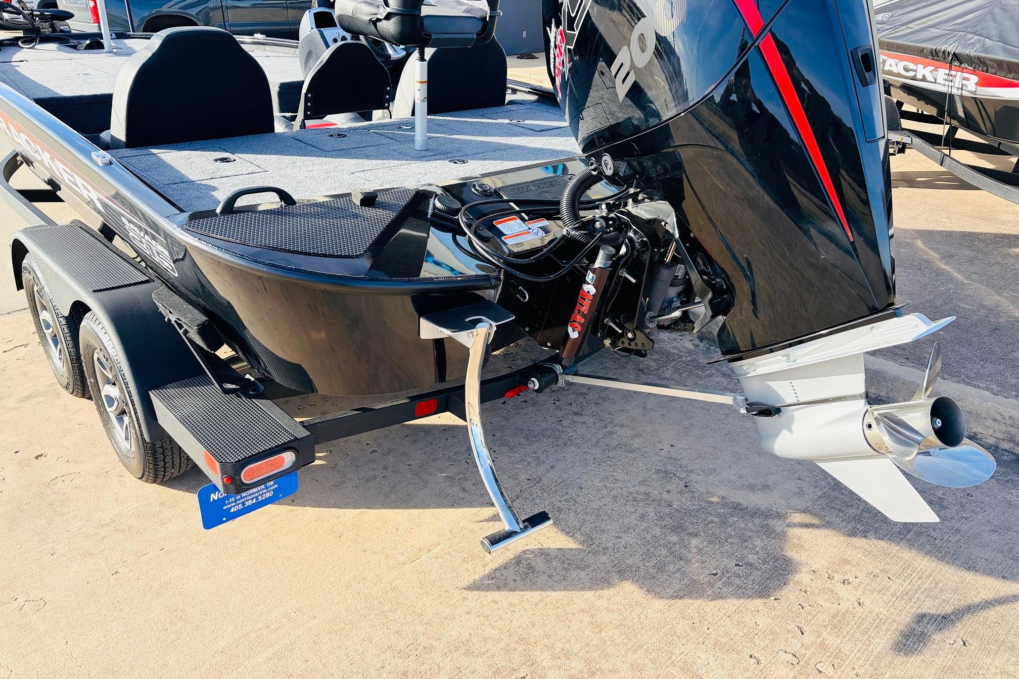 2025 Tracker Savage 215 boat with powerful outboard motor and dual-axle trailer.