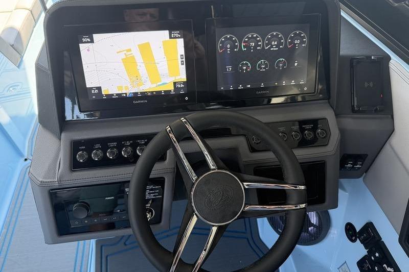 Dashboard of 2026 Cobalt R8 Surf boat with advanced navigation displays.