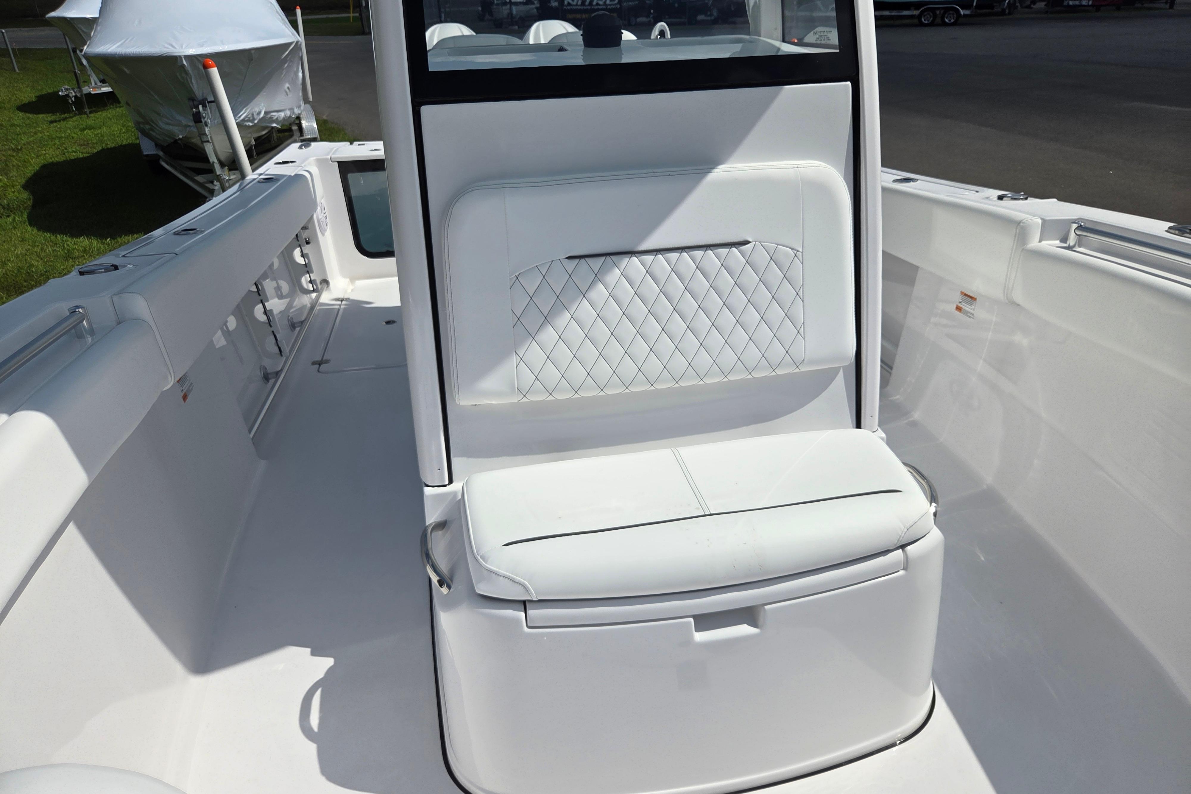 2026 Sportsman Open 252 Center Console boat interior with cushioned seating.