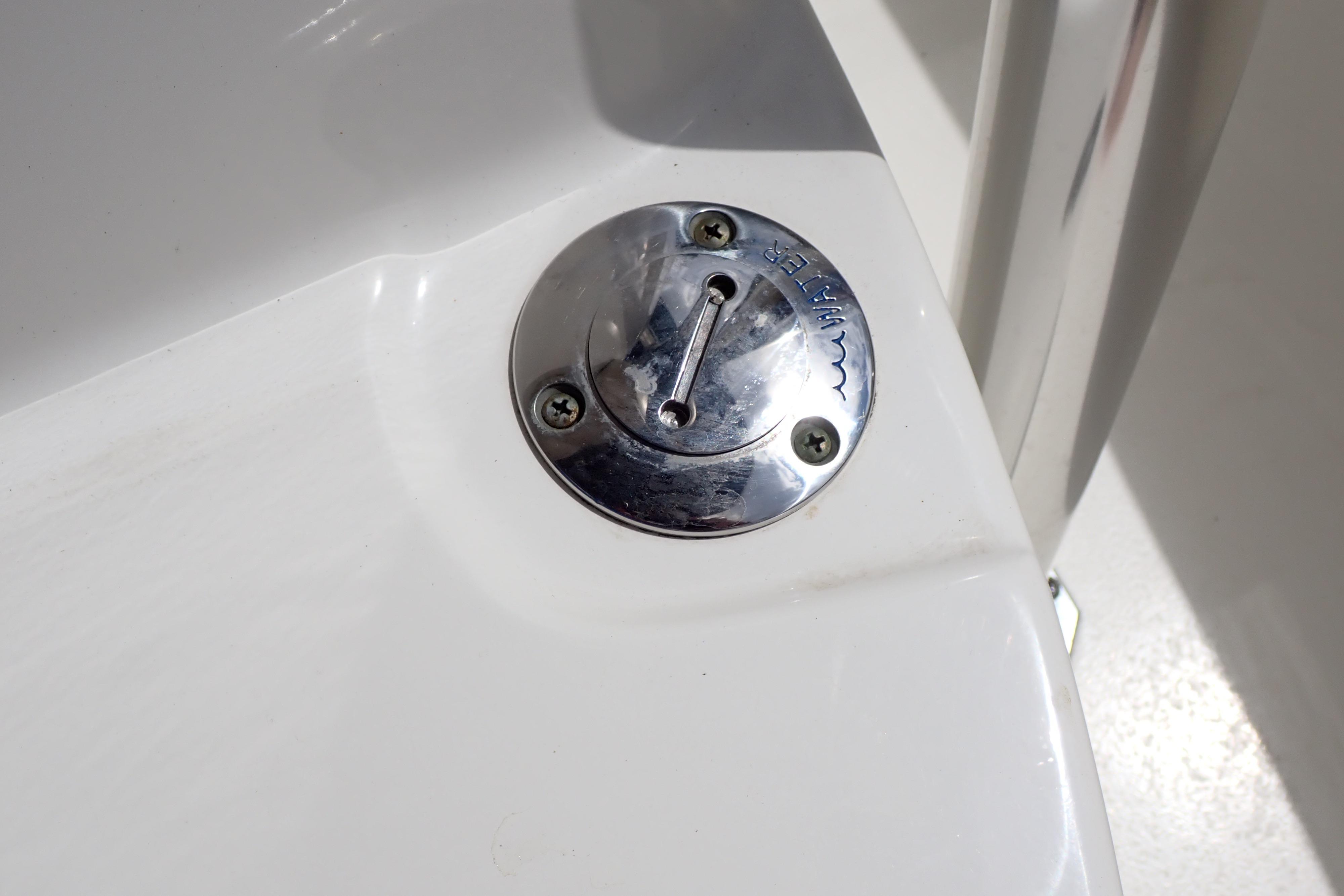 2019 Key West 263 FS boat water fill cap on white deck.