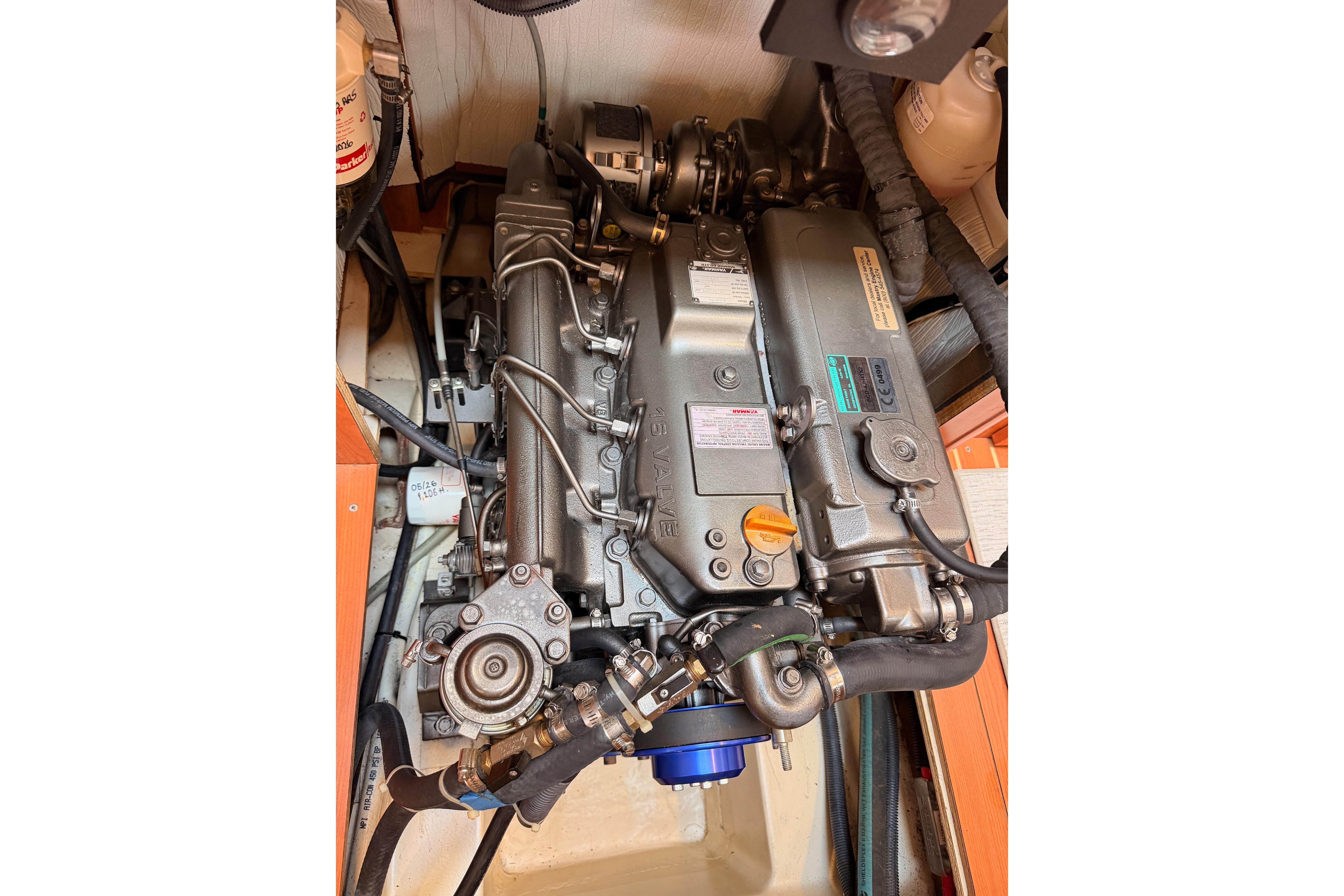 Engine compartment of a 2008 Hunter 45 Deck Salon sailboat, showcasing detailed components.