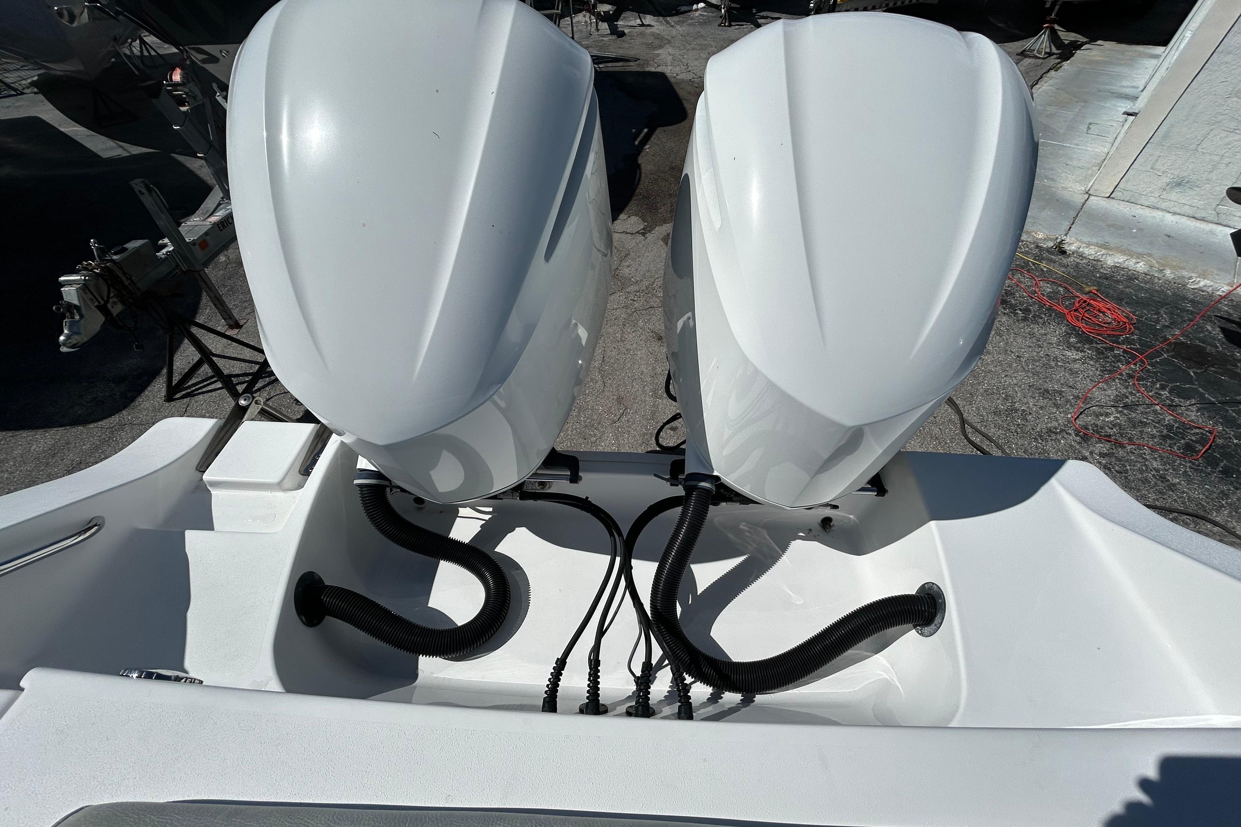 2019 Sportsman Open 282 Center Console with dual outboard engines, viewed from above.