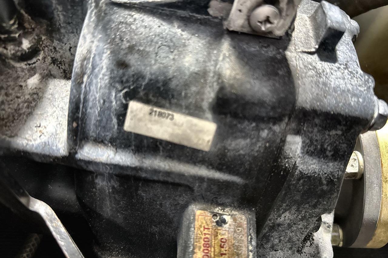 Close-up of a 2020 Supra SE engine component with visible serial numbers.