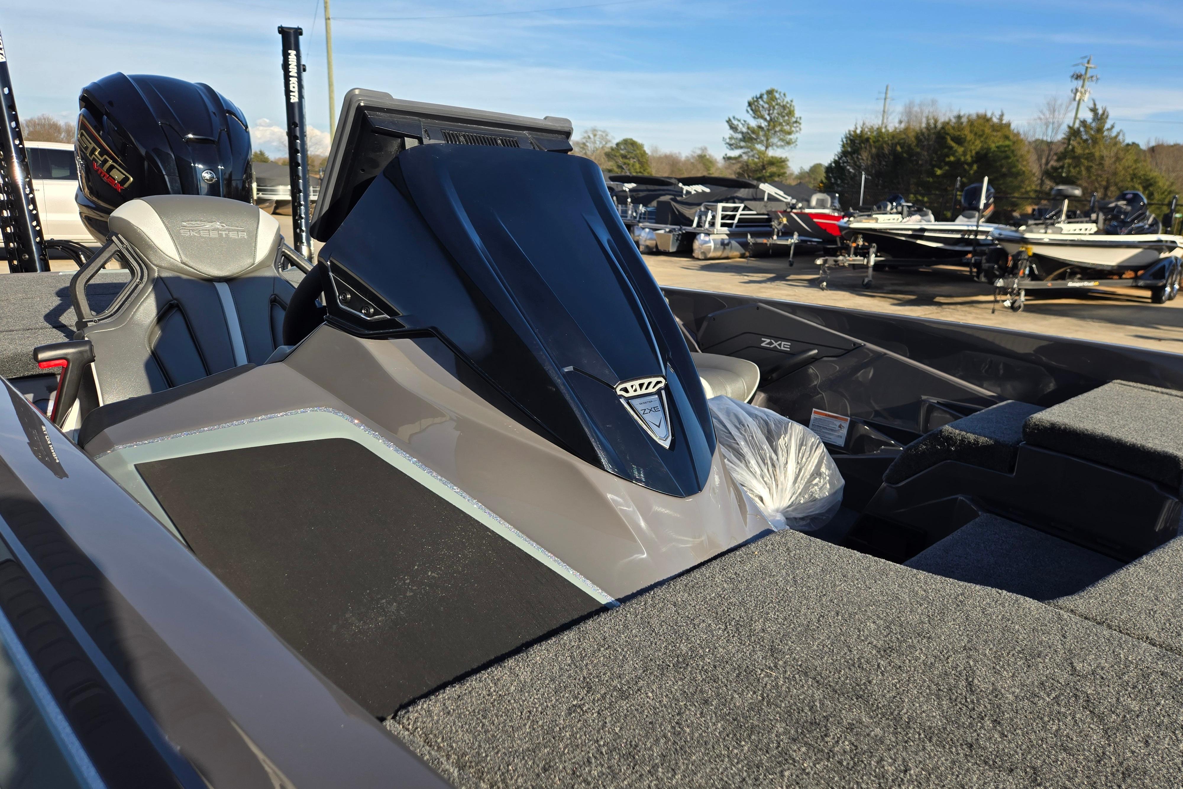 2026 Skeeter ZXE21 boat with sleek design and modern features, displayed outdoors.
