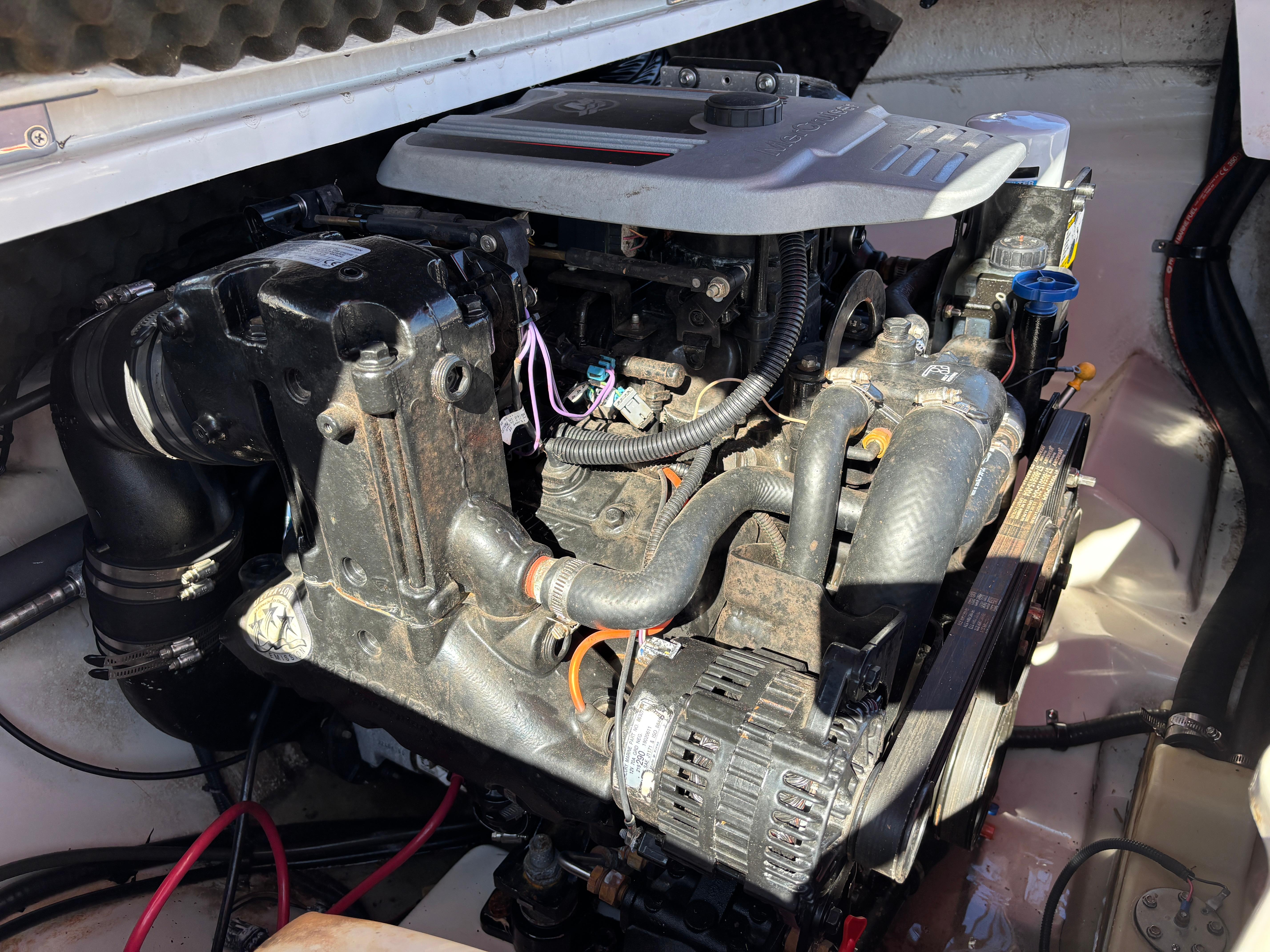 2011 Tracker Tahoe Q5i boat engine, detailed view of components and wiring.