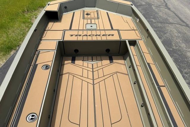2026 Tracker Grizzly 1756 T Marsh boat interior with tan deck and sleek design.