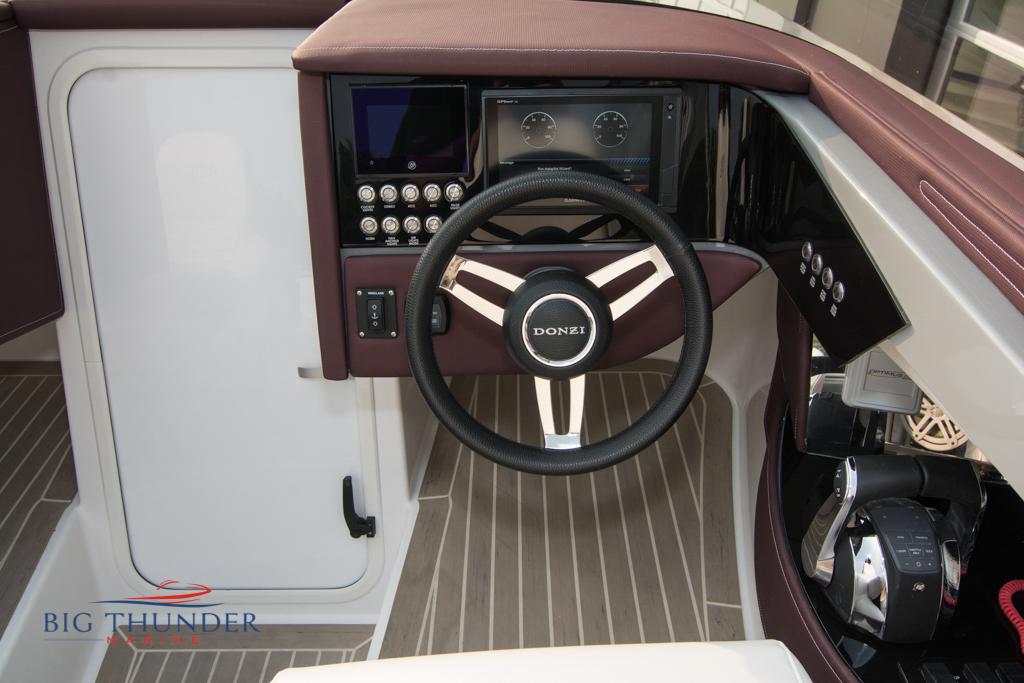 2019 Donzi 41 GT boat steering wheel and dashboard with Big Thunder Marine logo.
