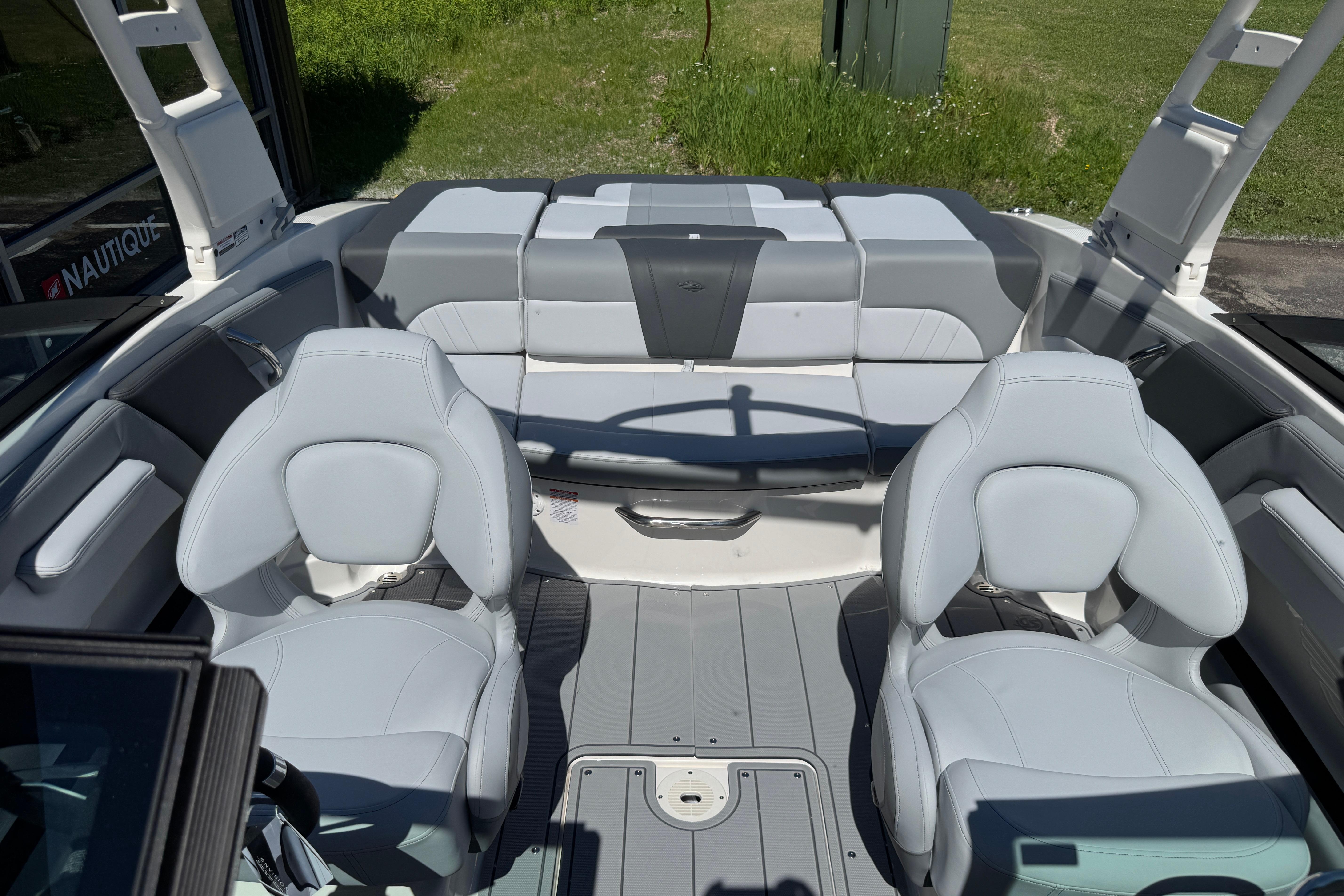 Interior of 2026 Chaparral 21 SSi boat with modern seating and sleek design.