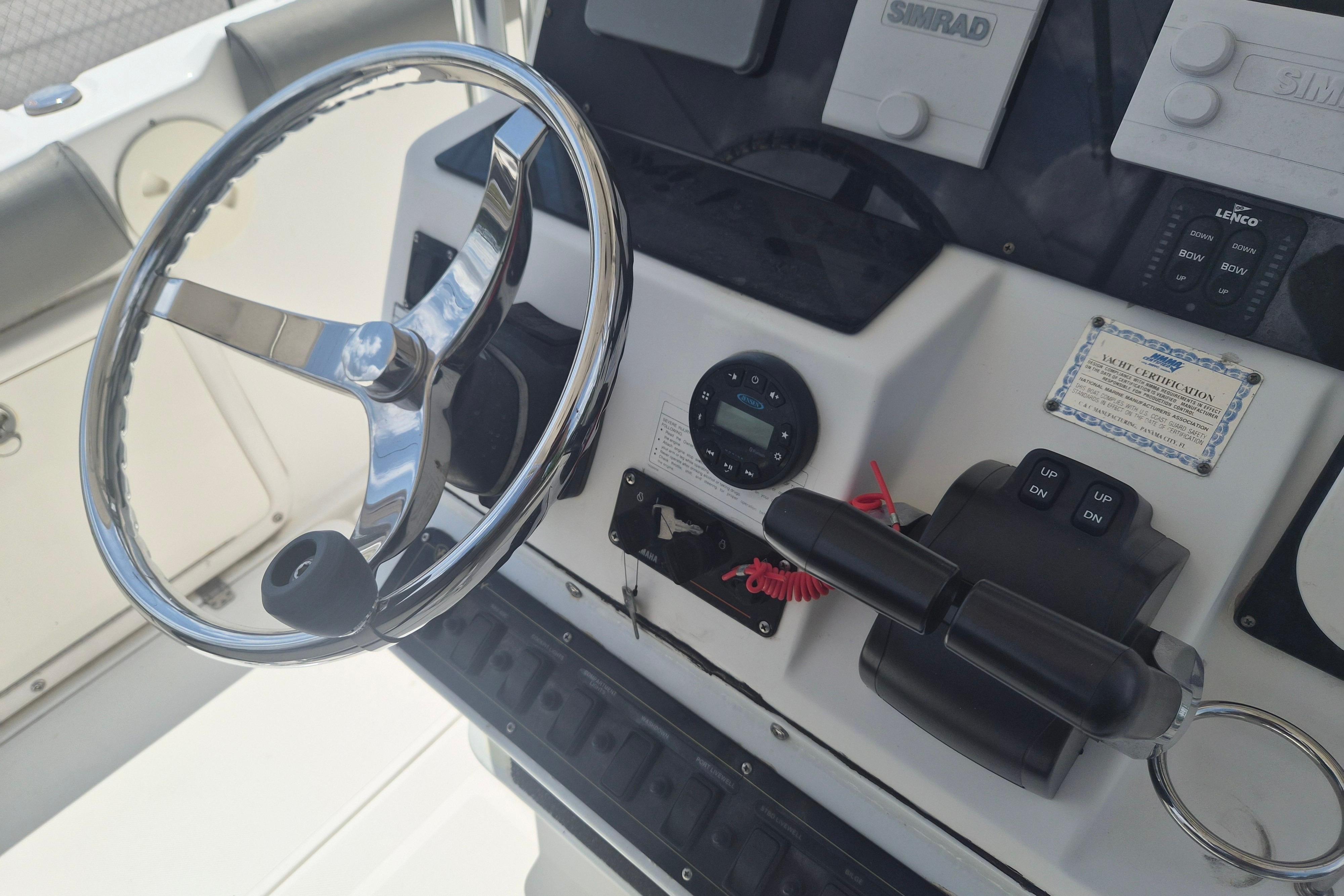 2006 Century 2900 Center Console boat steering wheel and control panel.
