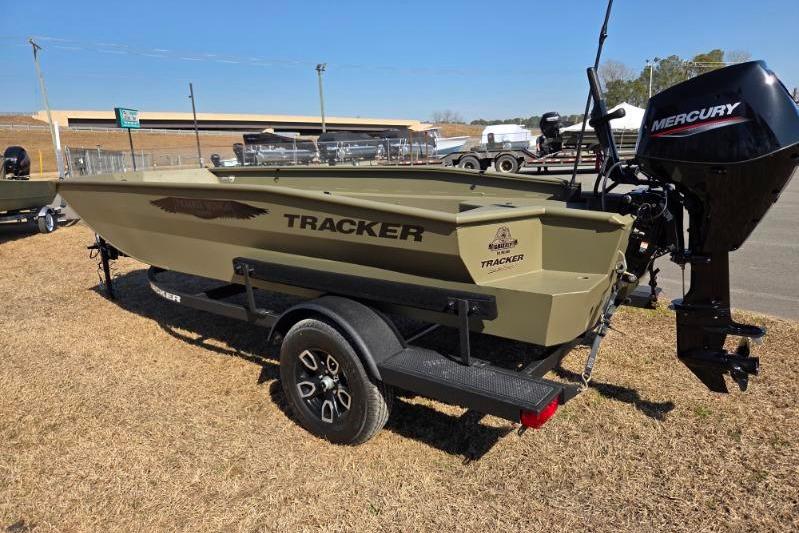 2026 Tracker Grizzly 1650 T Prairie Wings Edition boat with Mercury engine on trailer.
