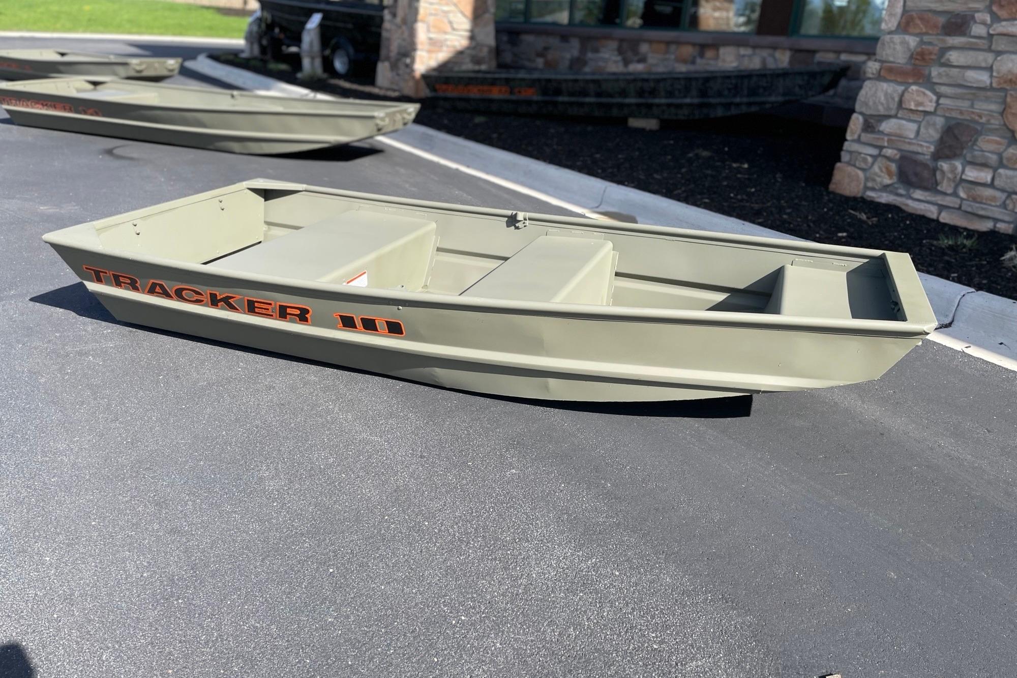 2026 Tracker Grizzly 10 Jon boat on pavement, showcasing its compact design.