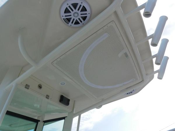 2025 Sailfish 232 CC boat roof with speakers and rod holders.