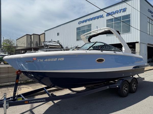 2023 Chaparral 267 SSX boat on trailer outside Chaparral dealership.