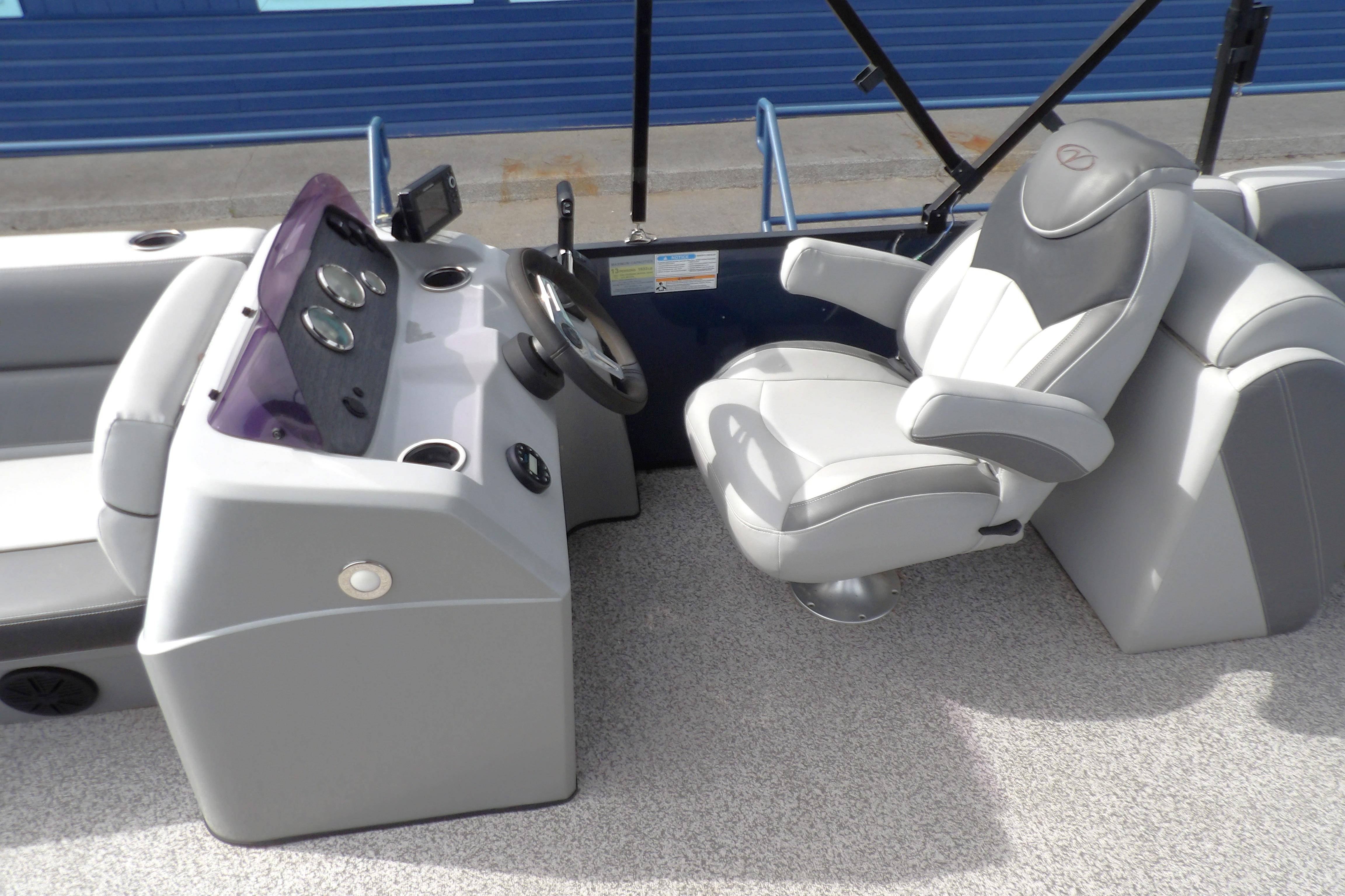 Captain's seat and helm of 2022 Veranda Vista View 22RC pontoon boat.