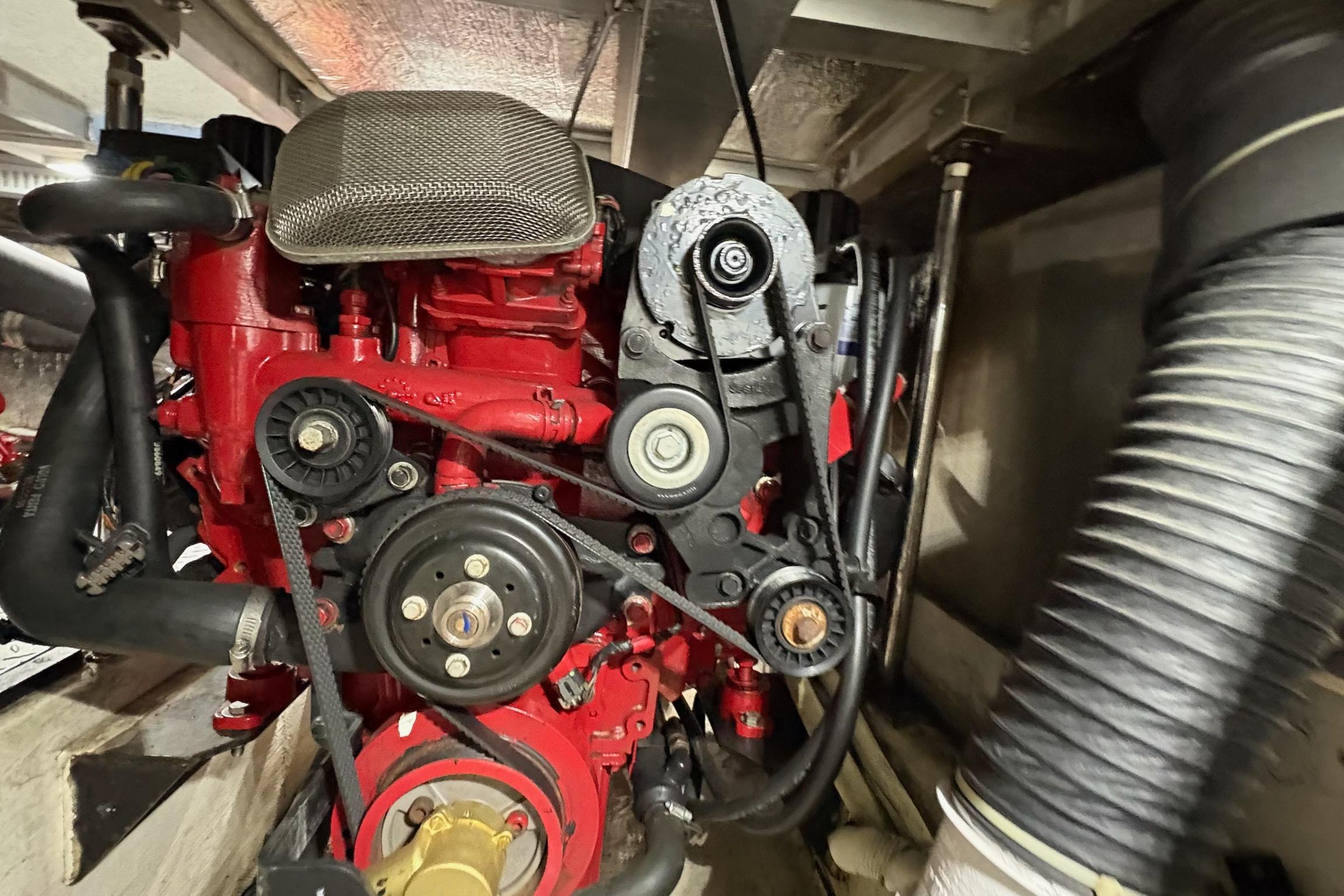 Engine compartment of a 2003 Carver 396 Motor Yacht, showcasing mechanical components.