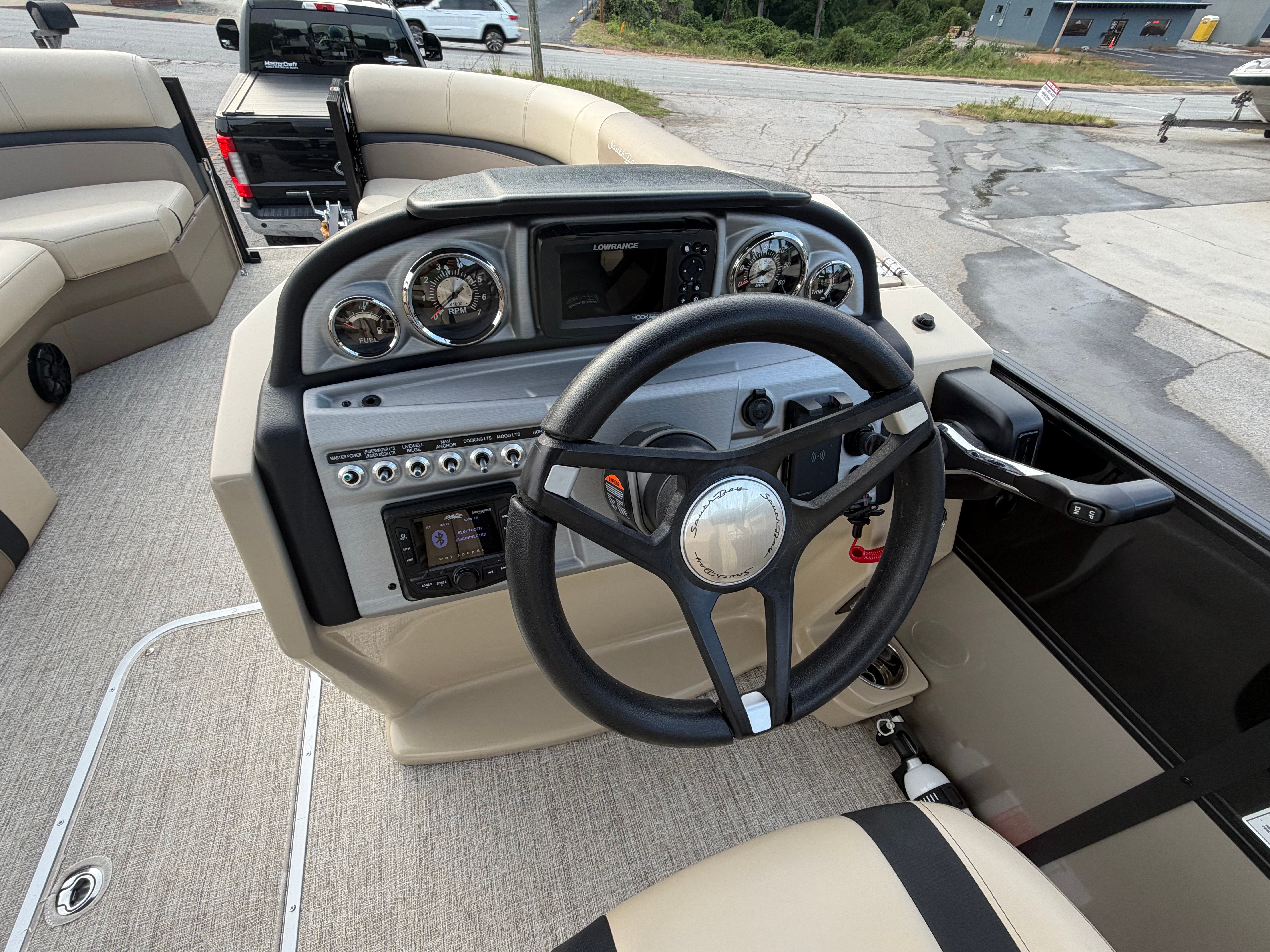 Interior view of 2023 South Bay S222 CR2 boat cockpit.