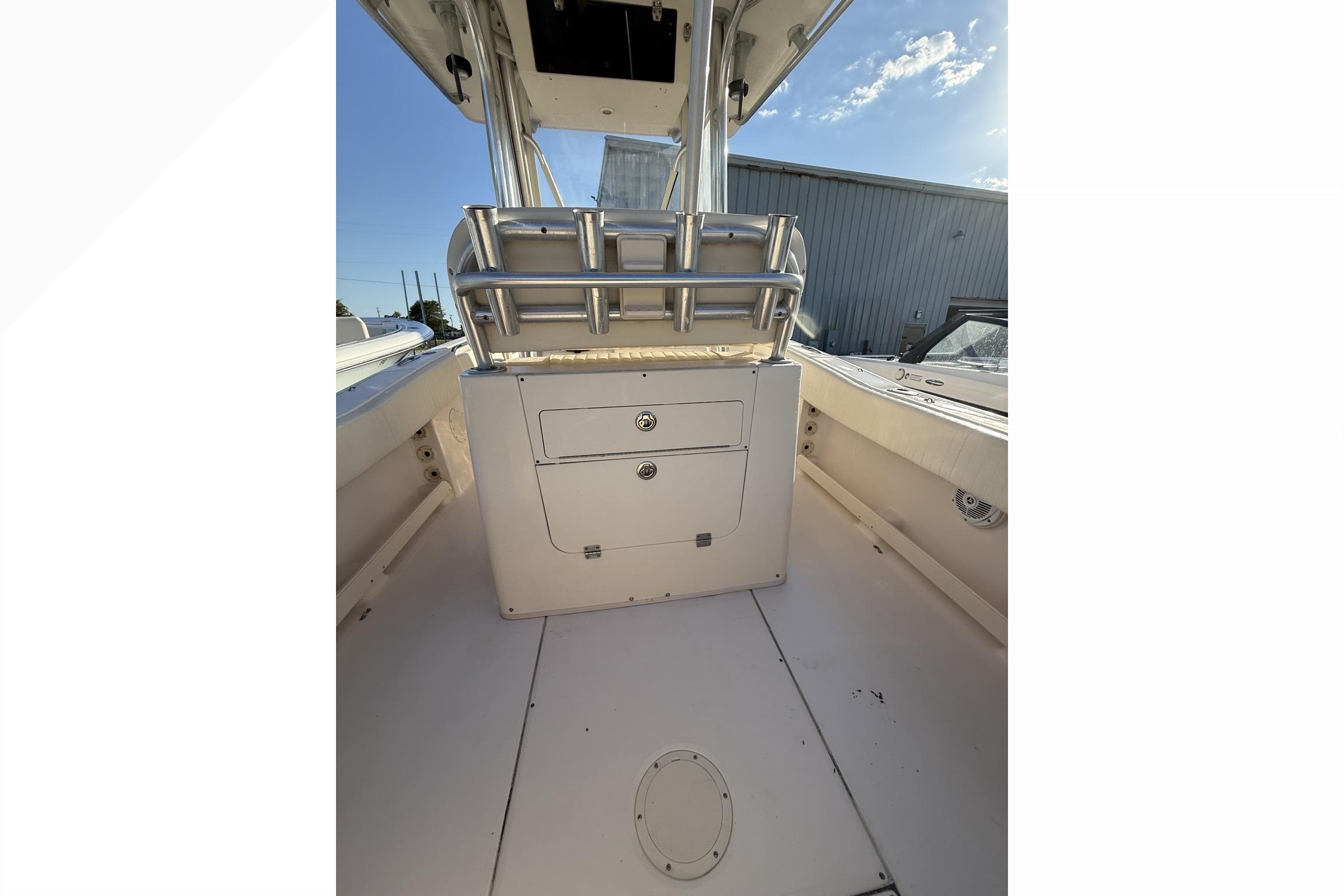 2011 Grady-White Fisherman 230 boat interior with storage compartments and seating.
