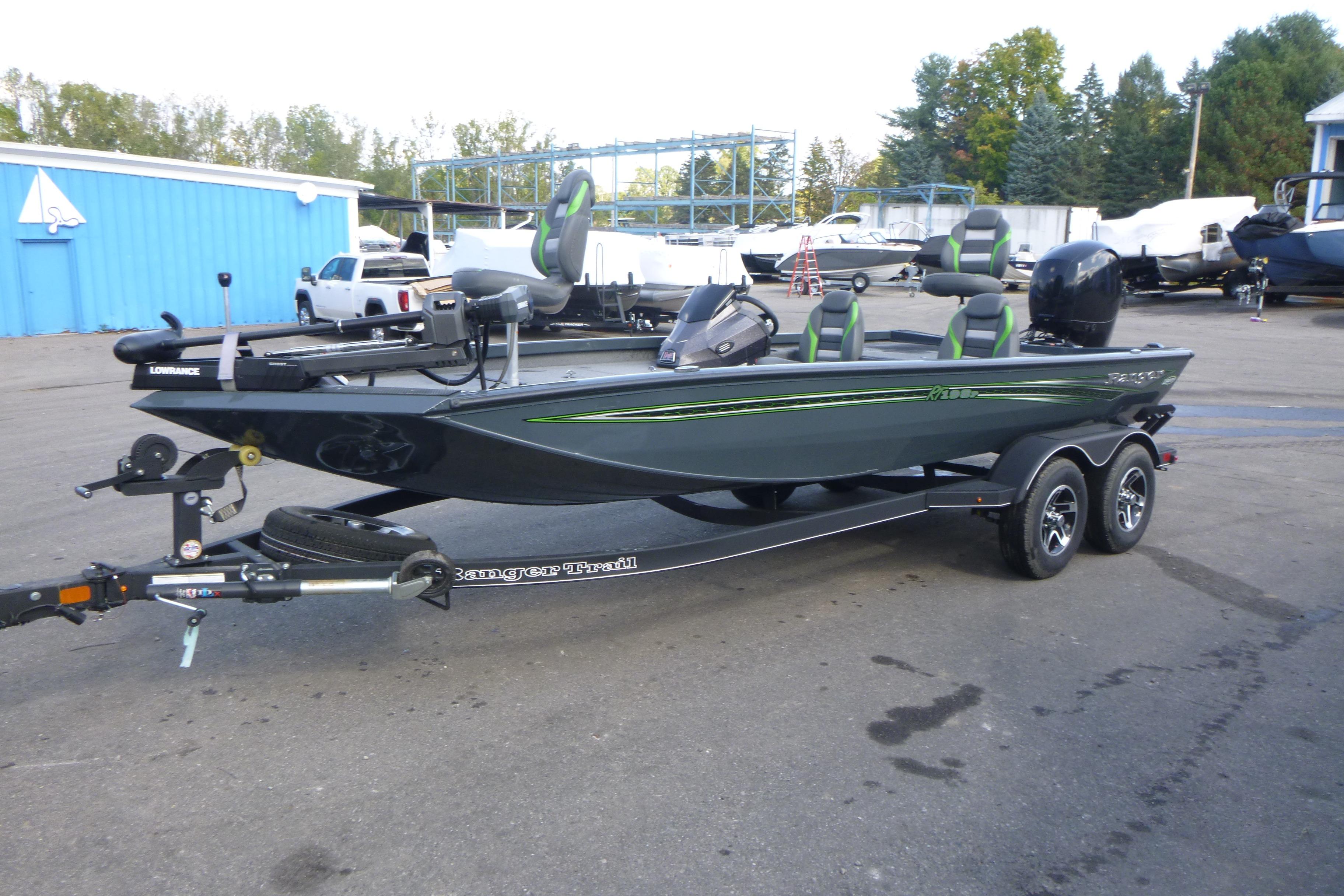 2023 Ranger RT198P fishing boat on trailer, parked outdoors.