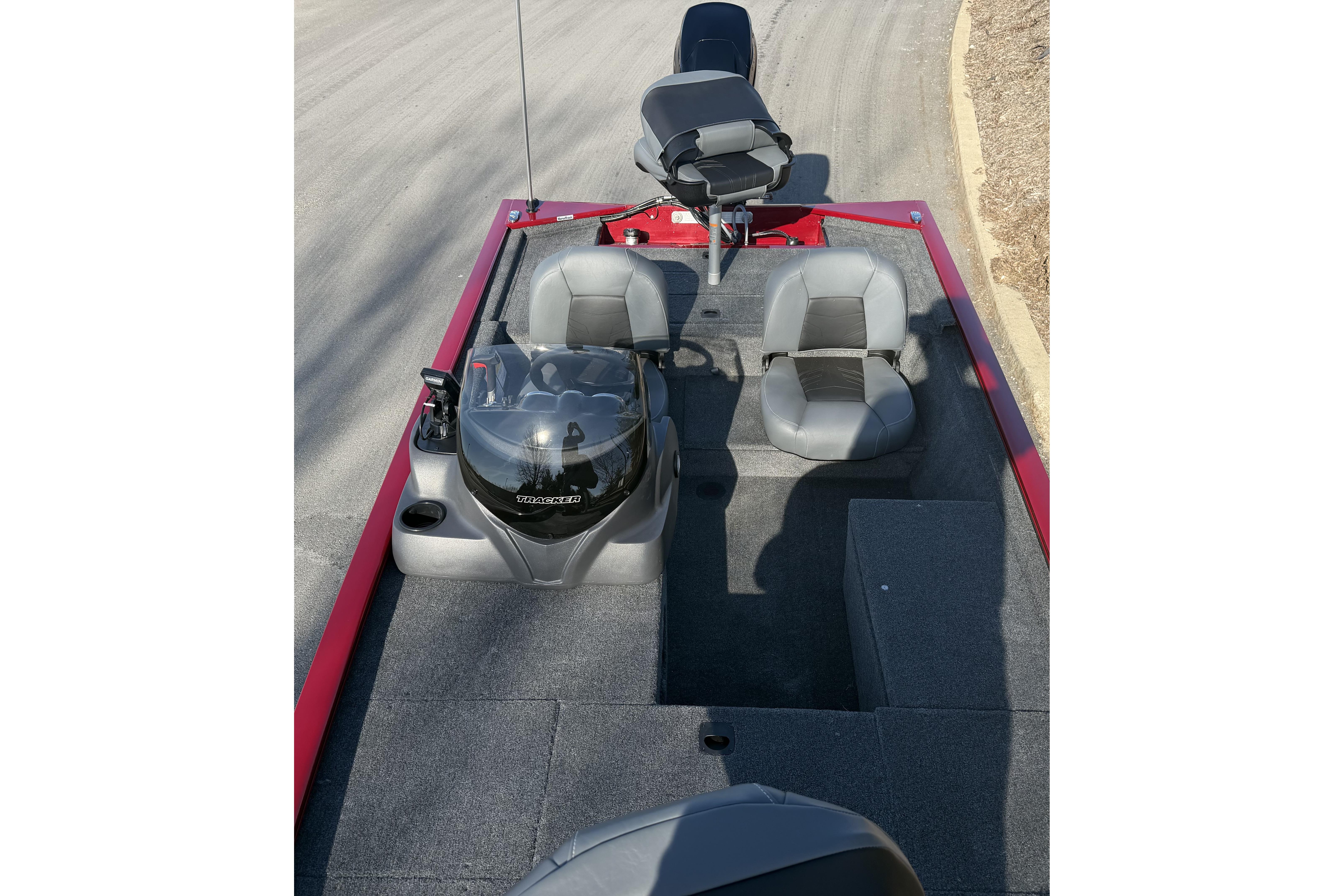 2026 Tracker Pro 170 boat interior with gray seating and red accents.